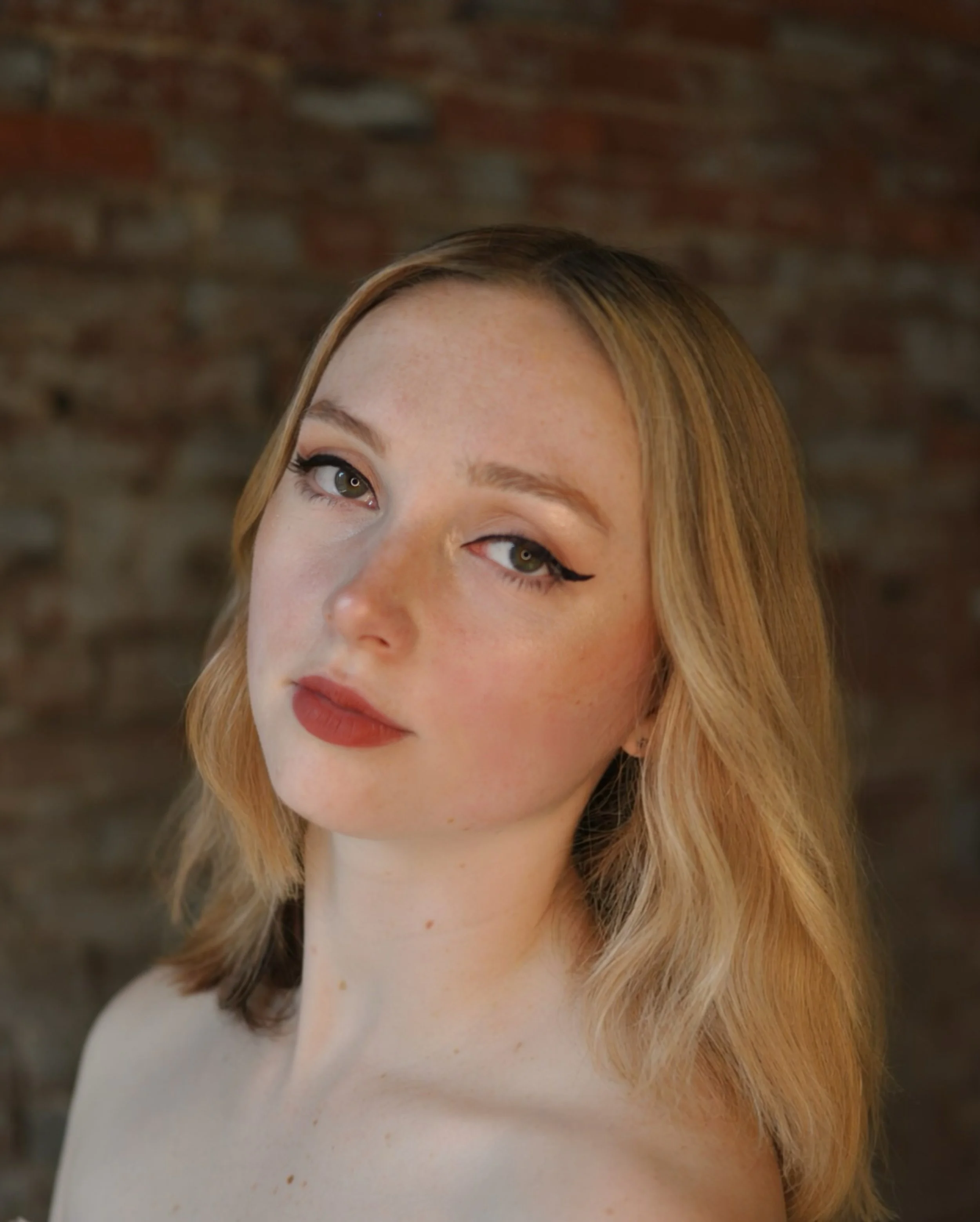 Grace E. Wellmon - Company Artist