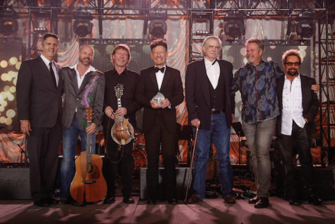 (L-R): ASCAP’s Randy Grimmett, Jon Randall, Sam Bush, Creative Voice Award honoree Lyle Lovett, Guy Clark, Robert Earl Keen, Tony Brown