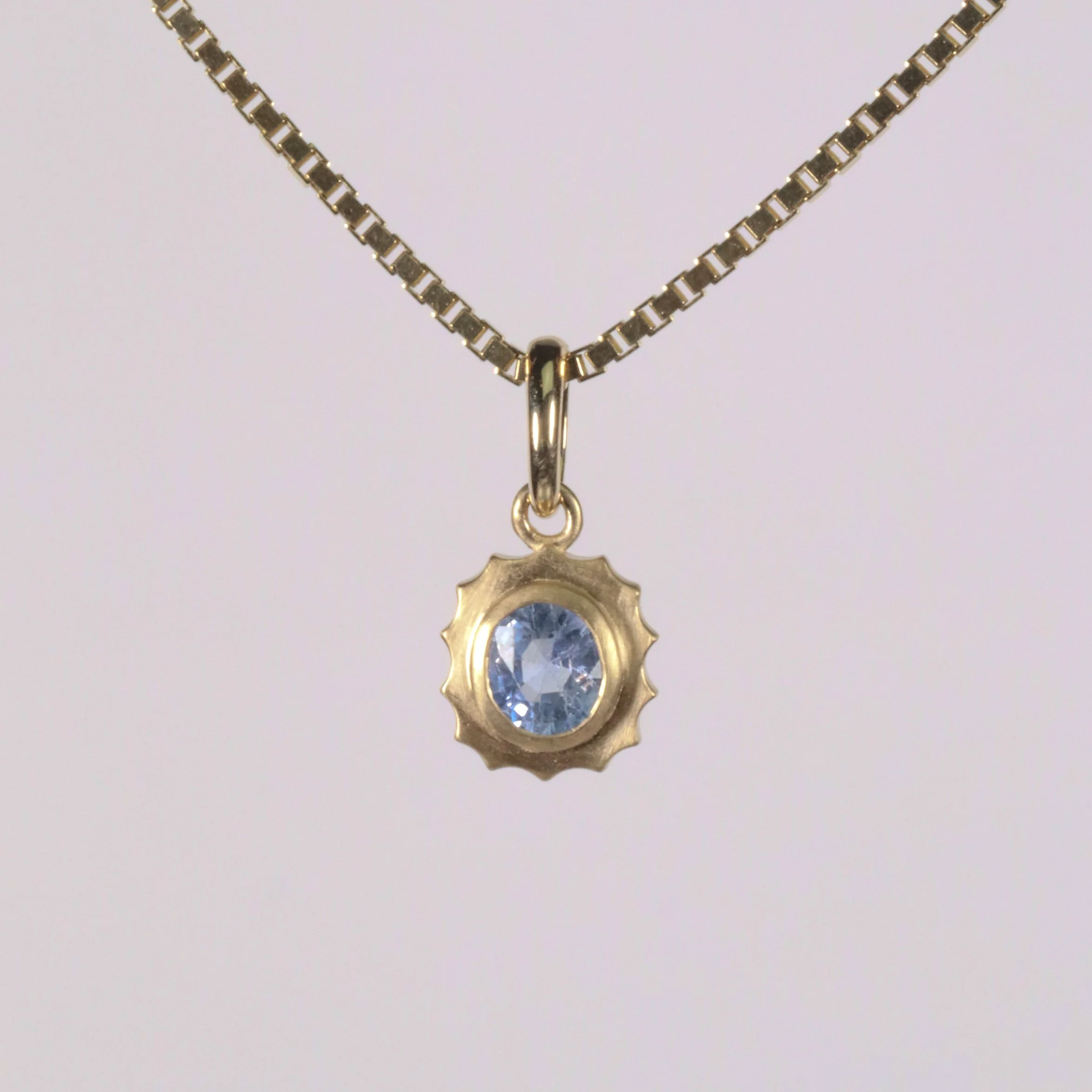 The Mini Tides Charm: 0.94ct Oval Sapphire