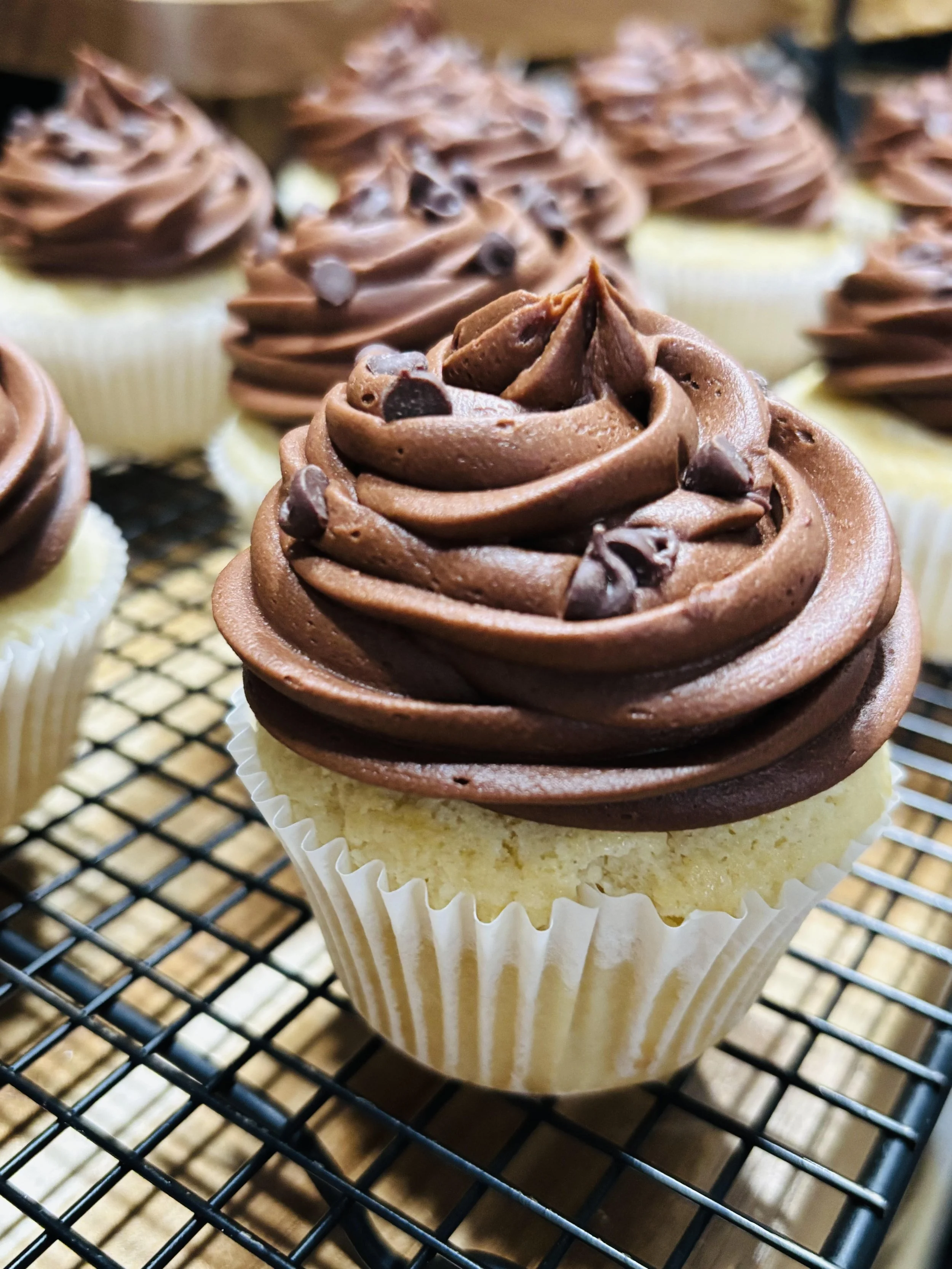 White Cupcakes w/ Chocolate Buttercream Frosting- Bakery Pick-up Only