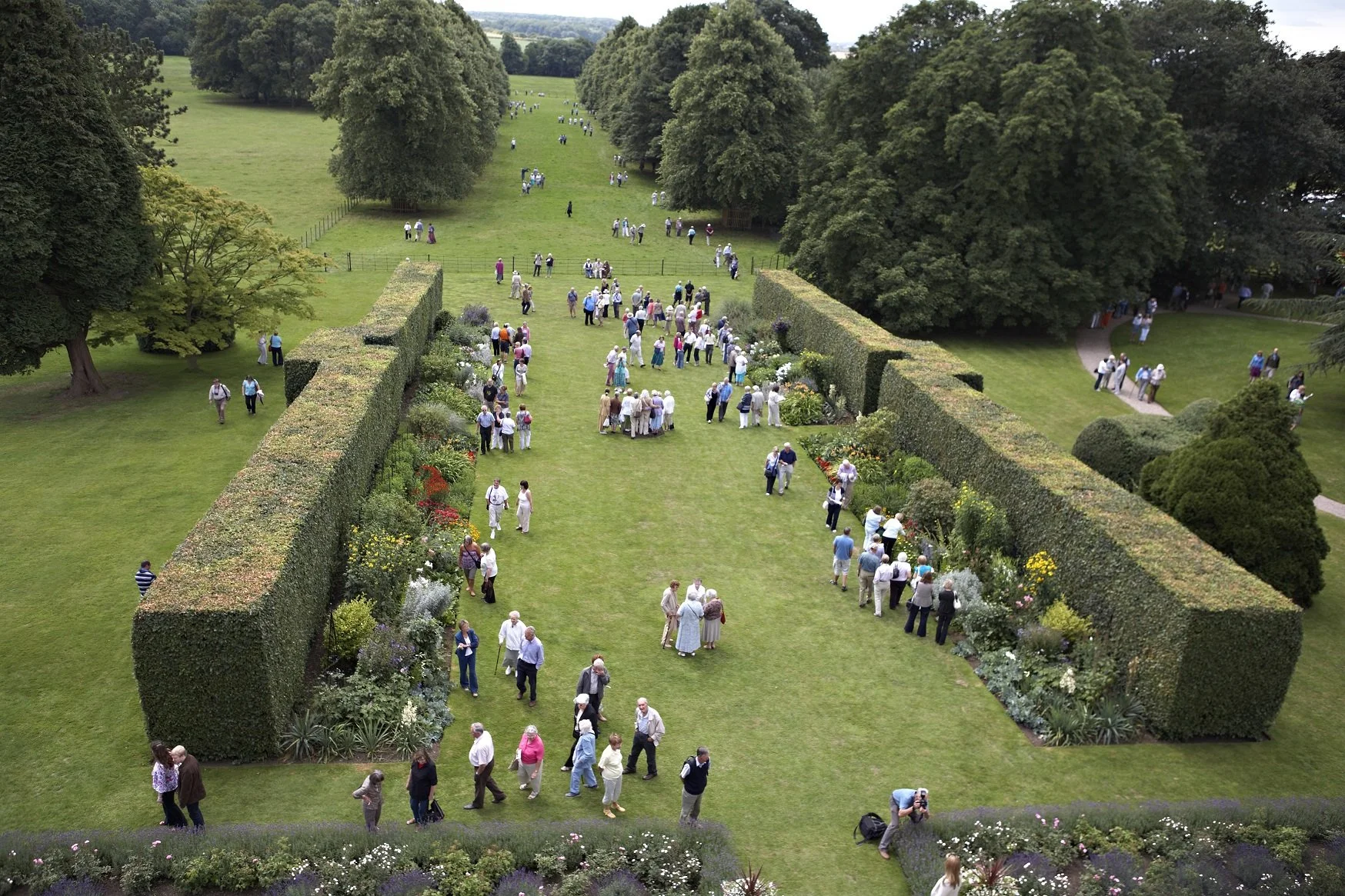 Aerial shot of hundreds of people in the Goldsborough Hall gardens during the summer opening in 2010