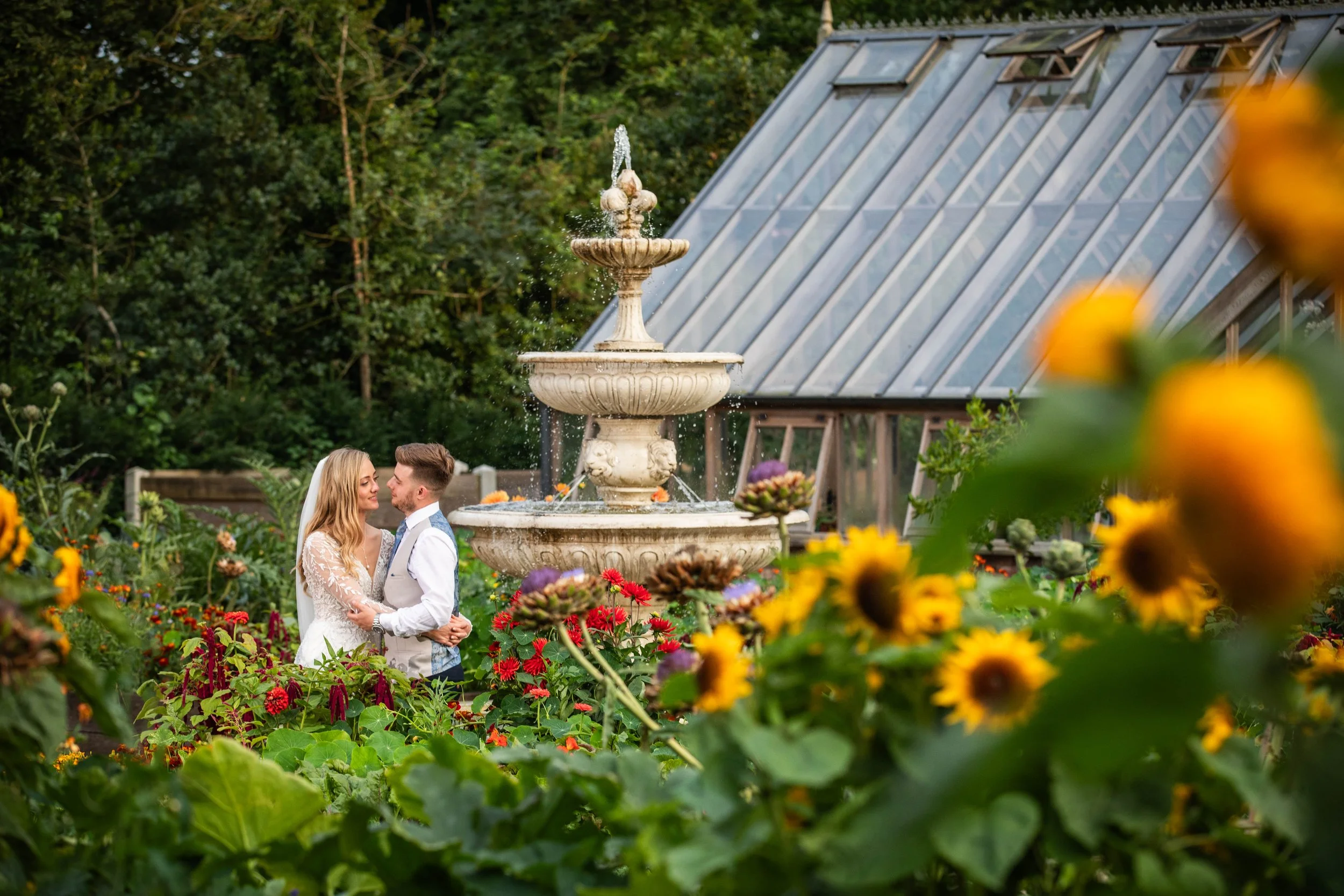 Wedding couple in the kitchen garden at Goldsborough Hall