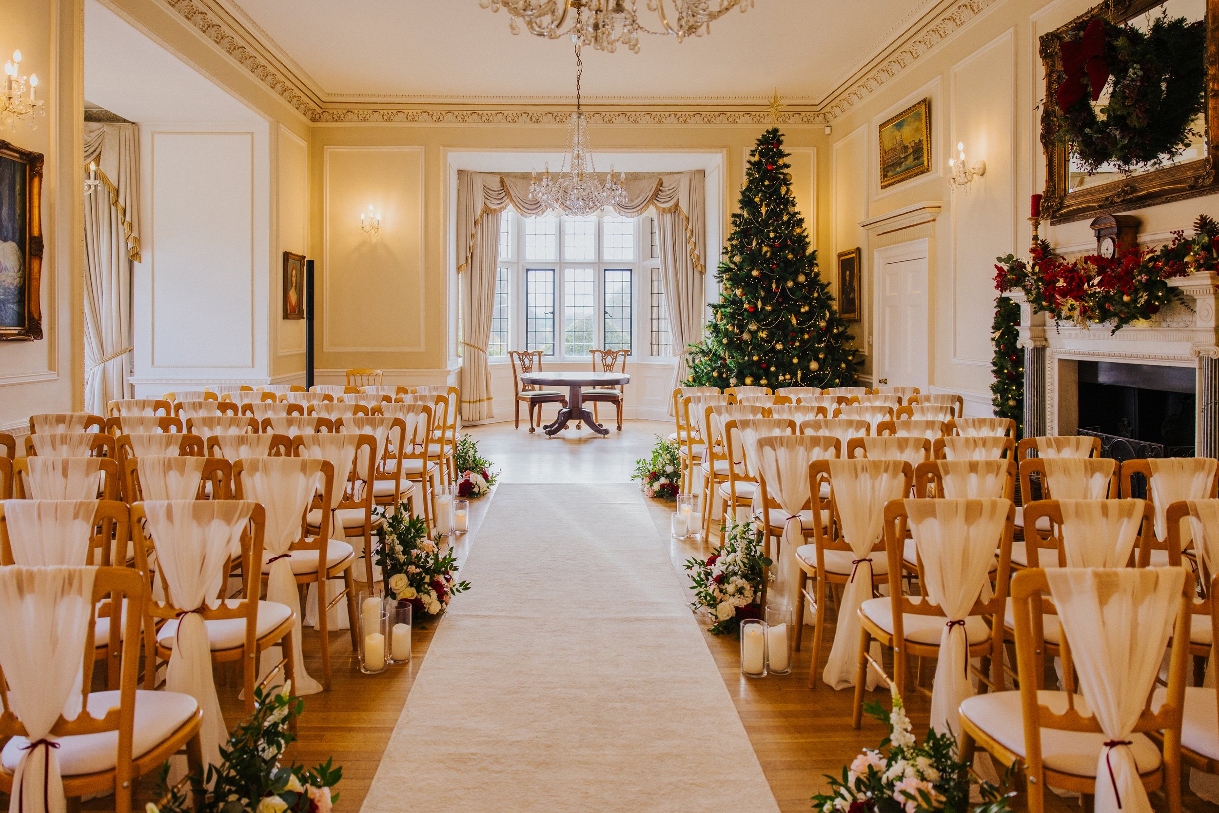 The drawing room set as a civil ceremony for a New Year's Eve wedding with all the Christmas decorations