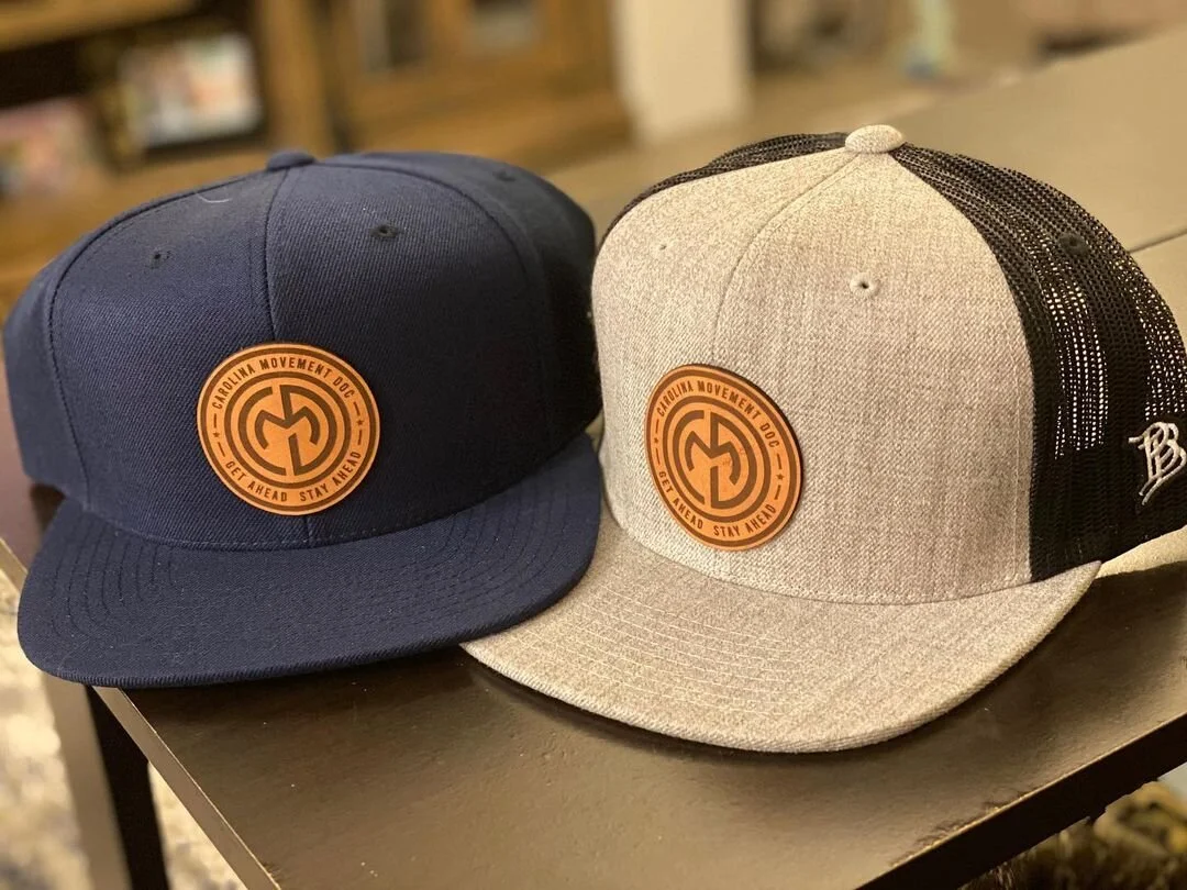 Carolina Movement Doc Merch_Logo on Hats.jpg