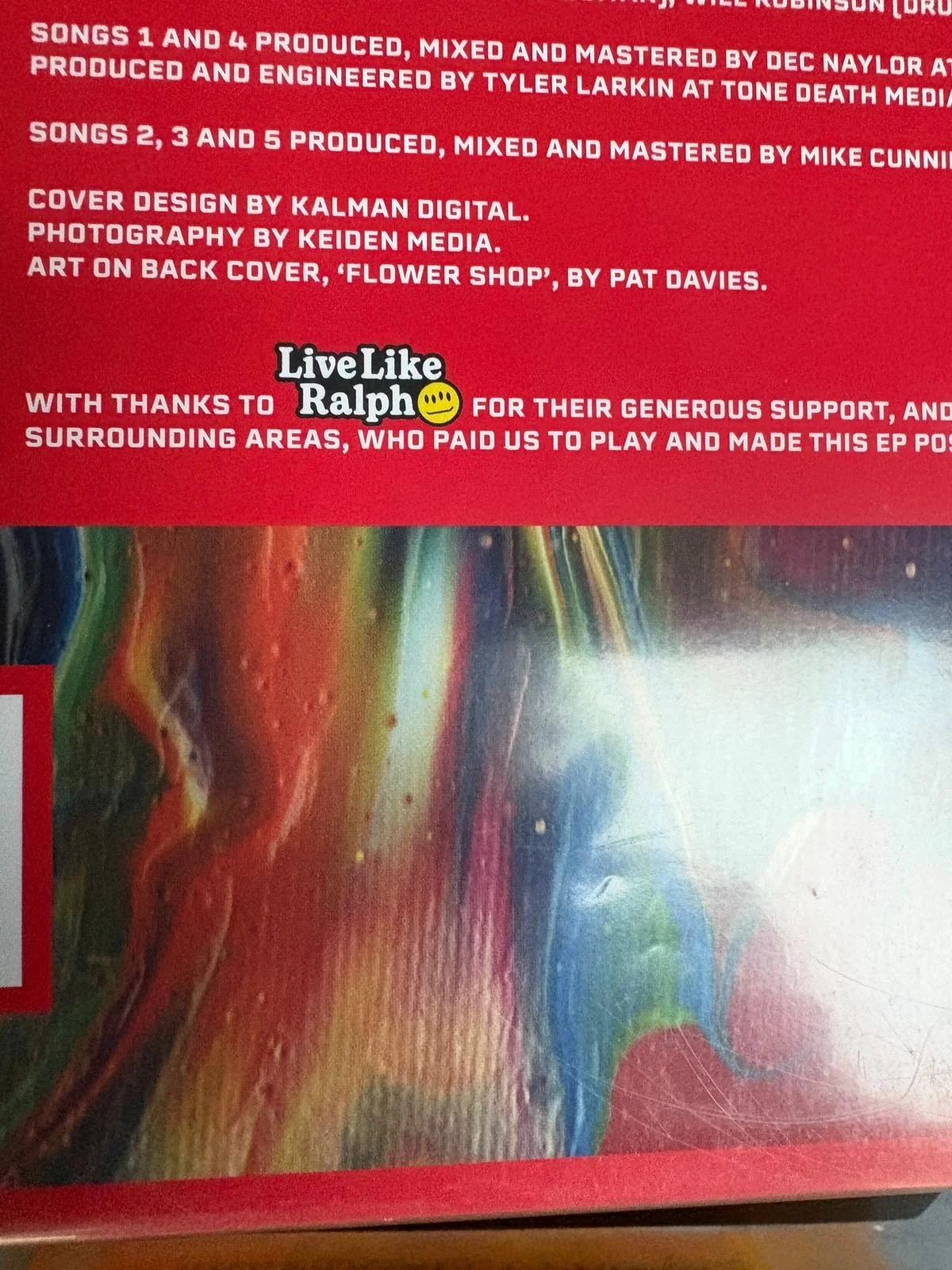 Close-up of a colorful, abstract background with a red overlay and white text, including a thank you message and support acknowledgment.