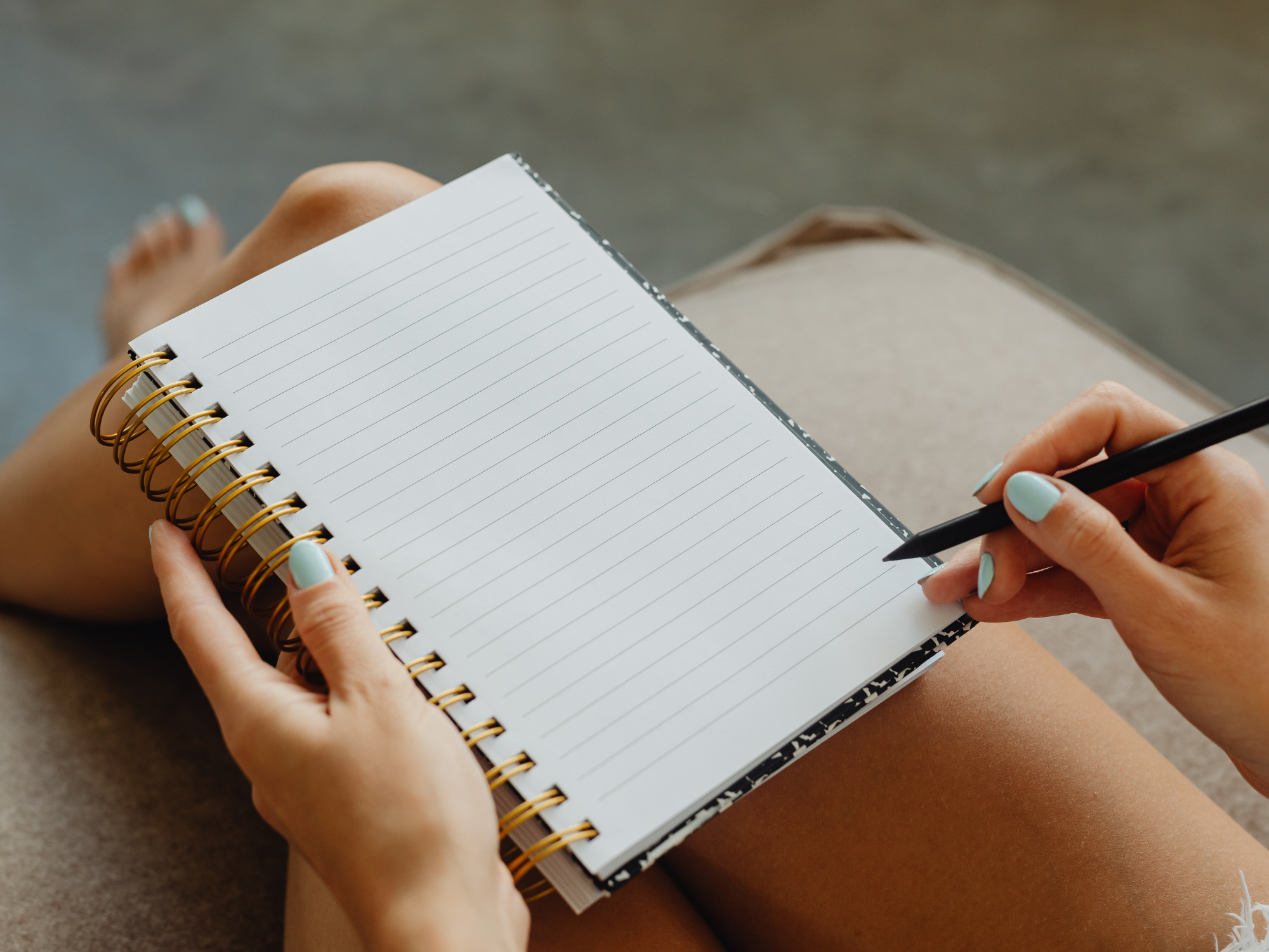 Woman journaling at SG Therapy Group Cleveland