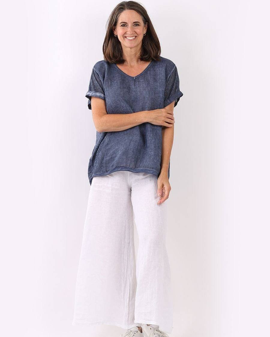👉 THIS is your summer wardrobe staple. 100% Italian linen, lightweight, dress up or down... you will LIVE in this top!

🎨 Comes in TEN color options! Beige, Black, Charcoal, Denim, Fuchsia, Green, Pink, Royal Blue, Navy, White

Which color(s) are y