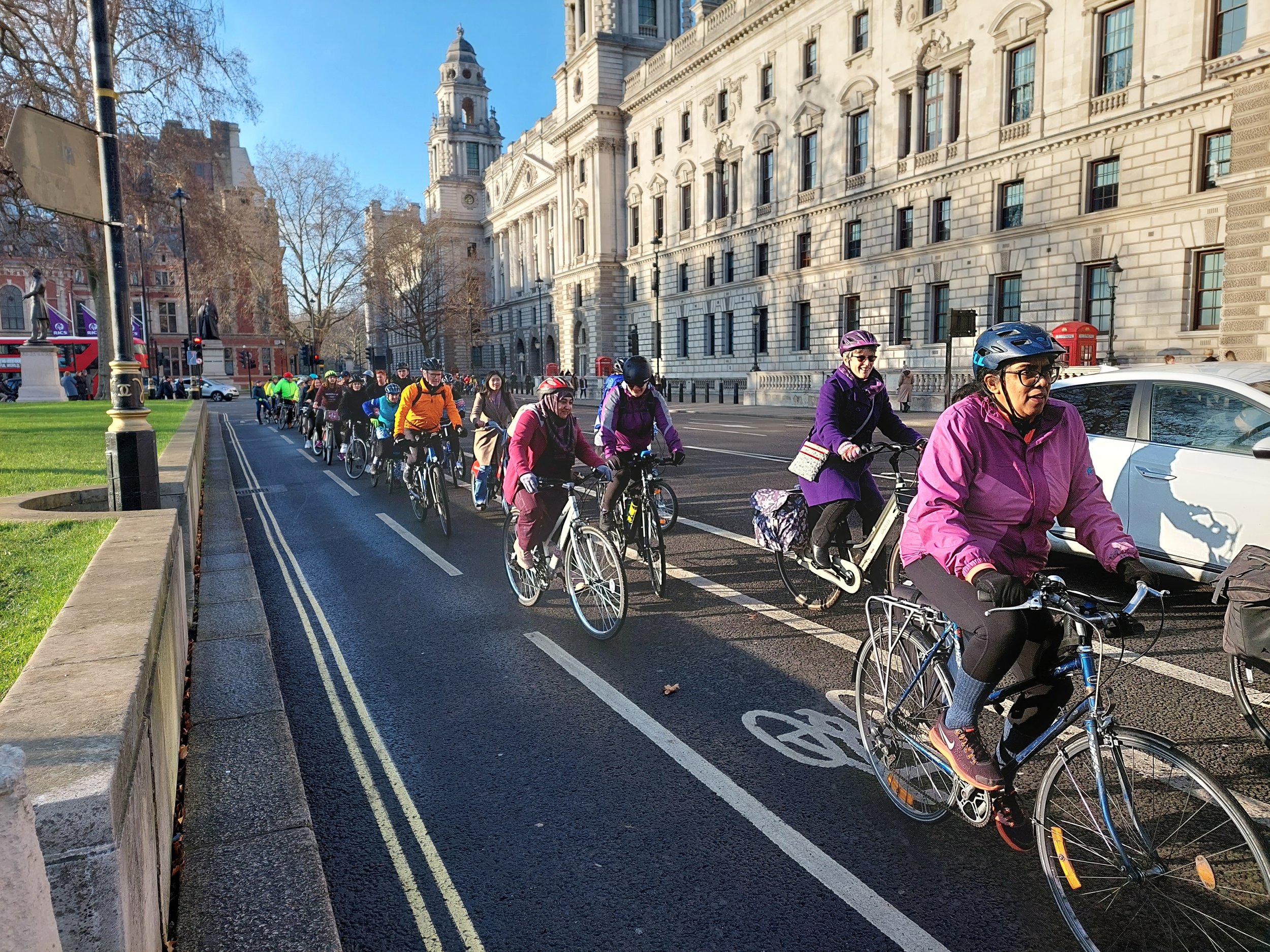 Riding past Parliament Square purple.jpg