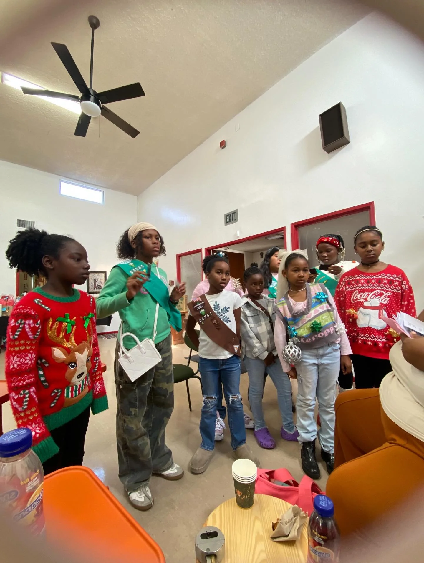 🎄Our troop looks like their about to drop the hottest Christmas album on the block! 🎅🏿
&zwnj;
Our G.IRL Scout Troop celebrated the holidays with a cute party at the clubhouse. They made snow globes, sang Christmas songs and had an &ldquo;Ugly Swea