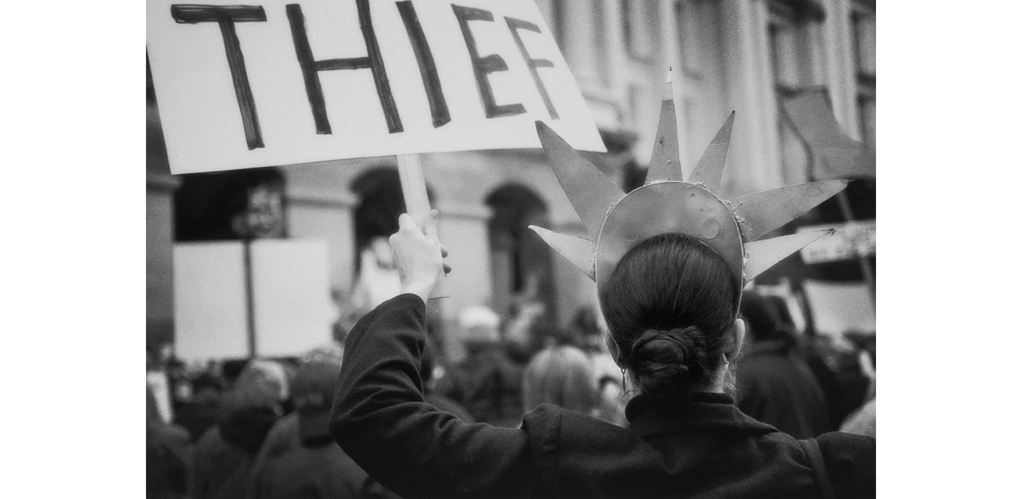 The contested presidential election of 2000 served as an ominous opening to the new millennium. At a counter-inaugural demonstration in January 2001, people expressed anger and outrage at a hallowed process gone wrong. Something was in the air; dange