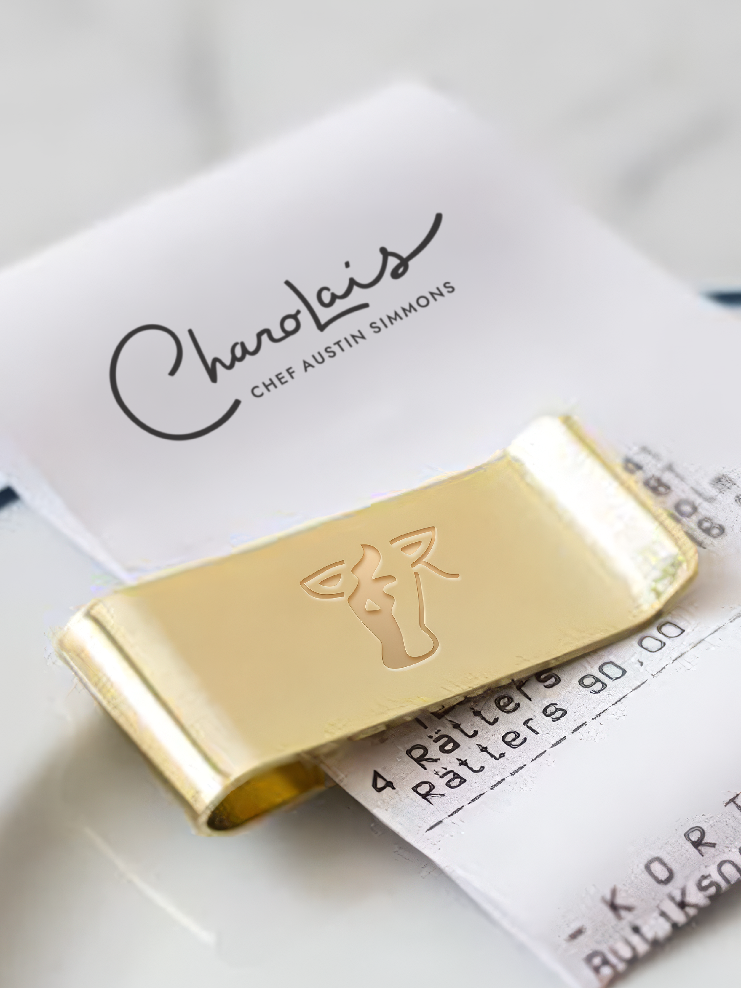 HiFi Brands created custom check presenters and receipt paper for Charolais by Chef Austin Simmons a new steak experience in The Woodlands. 