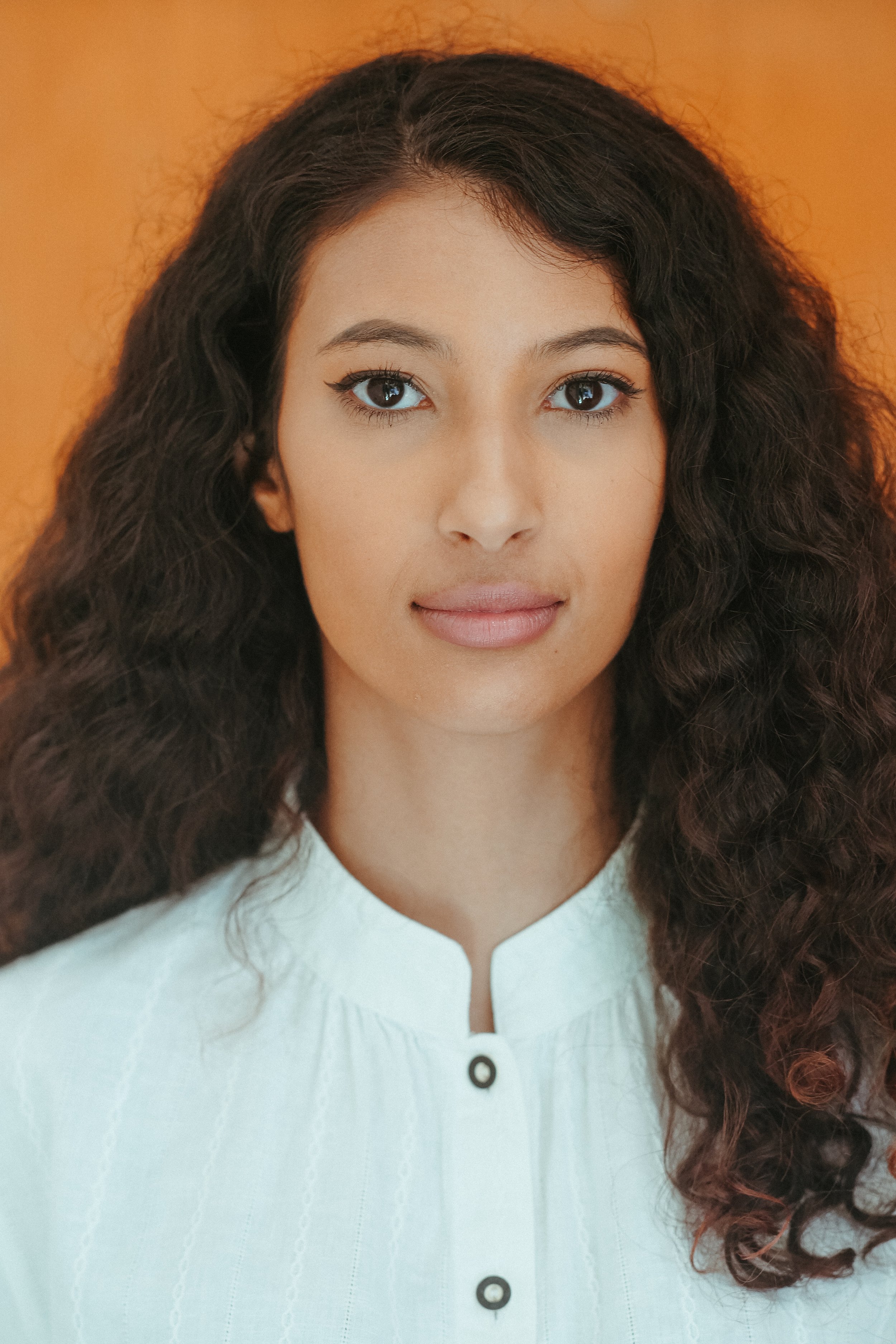 Omaima Headshot-2.jpg