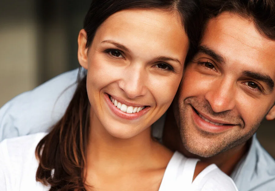 bigstock-Attractive-couple-smiling-whil-20114168.jpeg