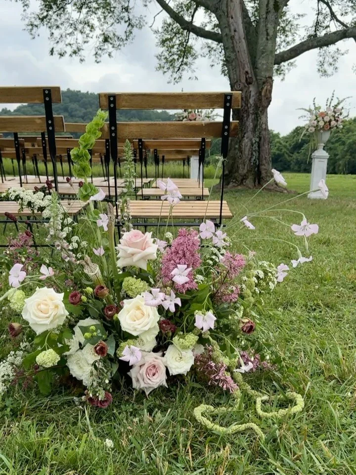 this ceremony design felt like a rain-soaked english garden, somewhere between hyde park and the tennessee countryside.
&bull;
#nashvillewedding #nashvilleflorist #2026bride #2027bride #weddingflowers