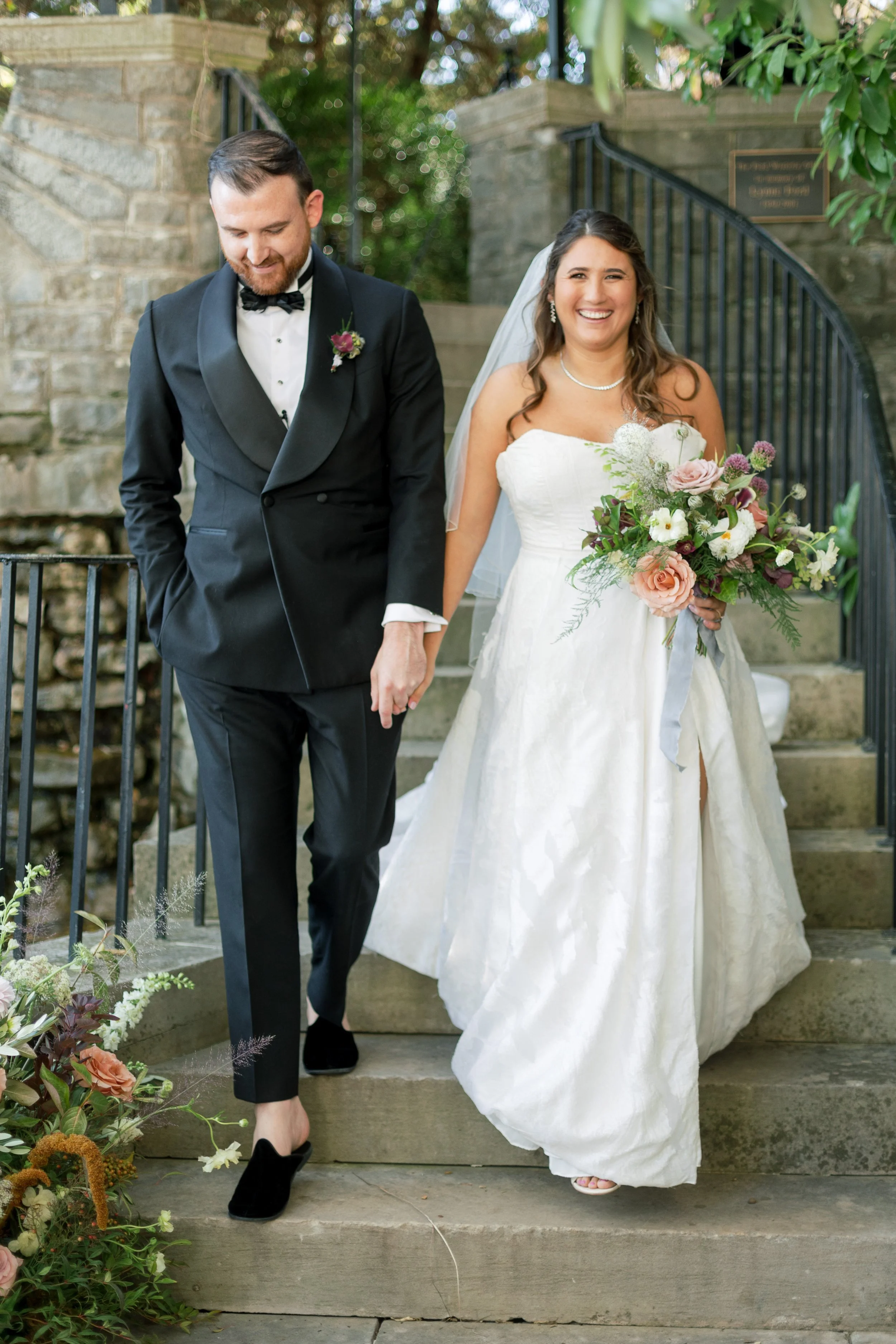 Nashville Wedding Venues Garden Venues bride and groom coming down the stairs