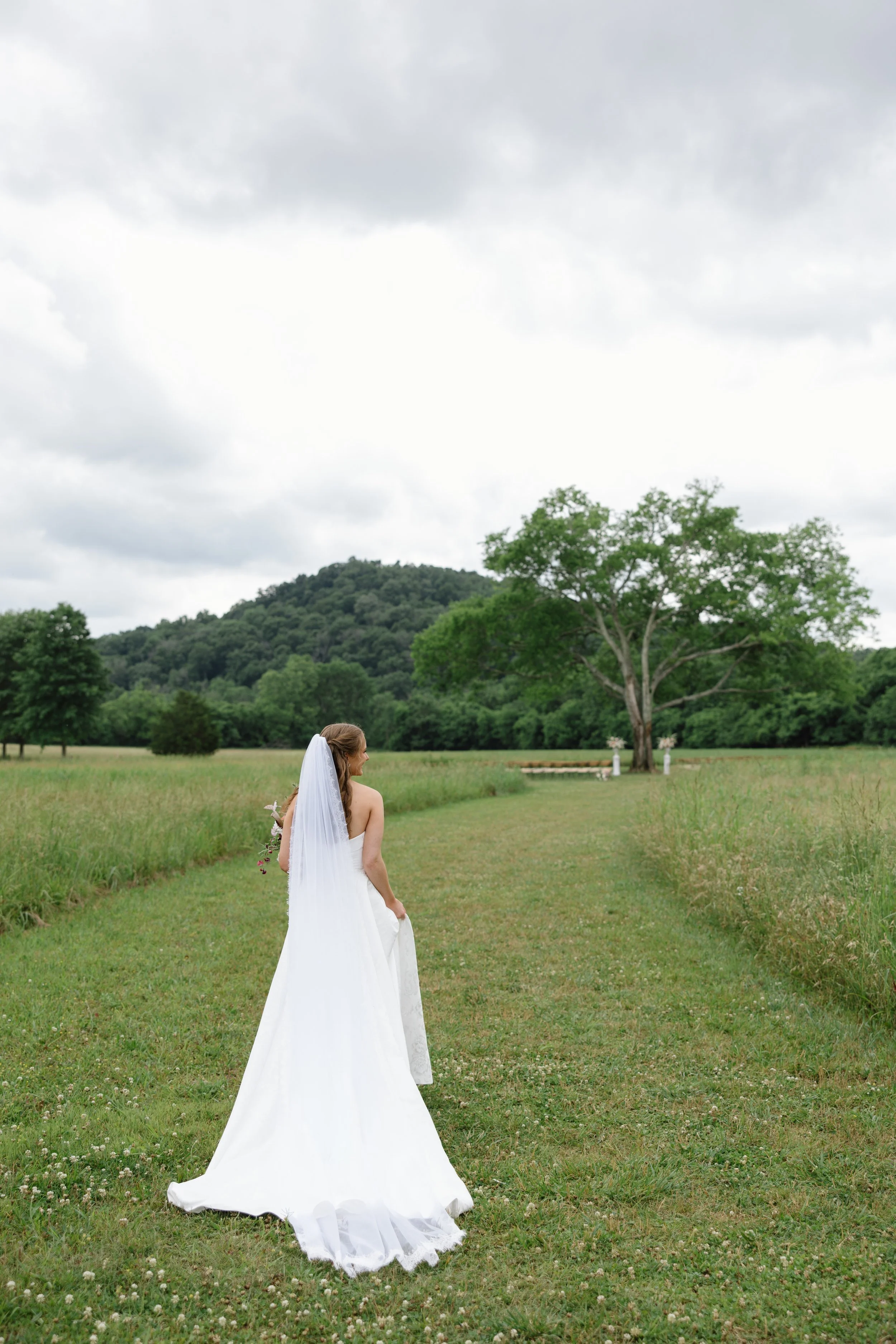 Nashville Wedding Venues Farm and Estate Venues bride in a meadow