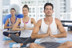 iStock_58686140_LARGE meditating group.jpg