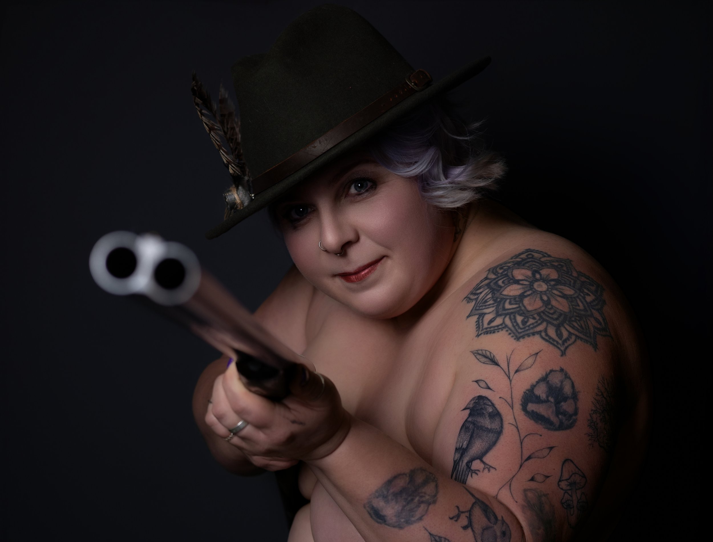 woman_holding_shotgun_clay_pigeon_shooting_heathfield_east_sussex.jpg