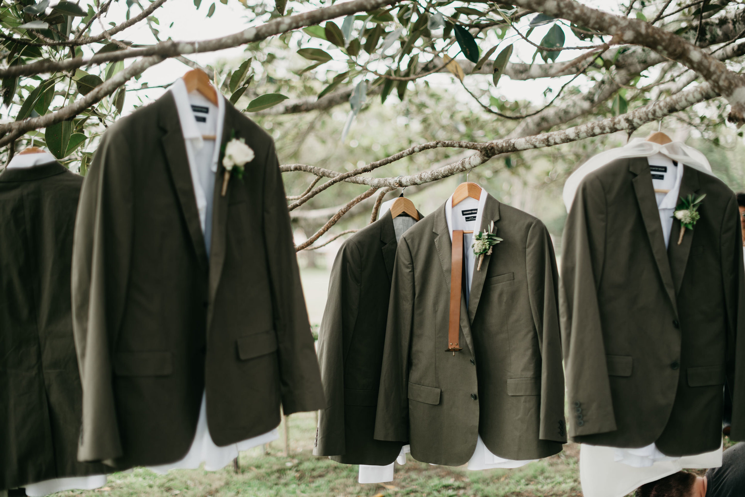 groom and groomsmen green khaki country road jackets - Trent and Jessie photography and videography 