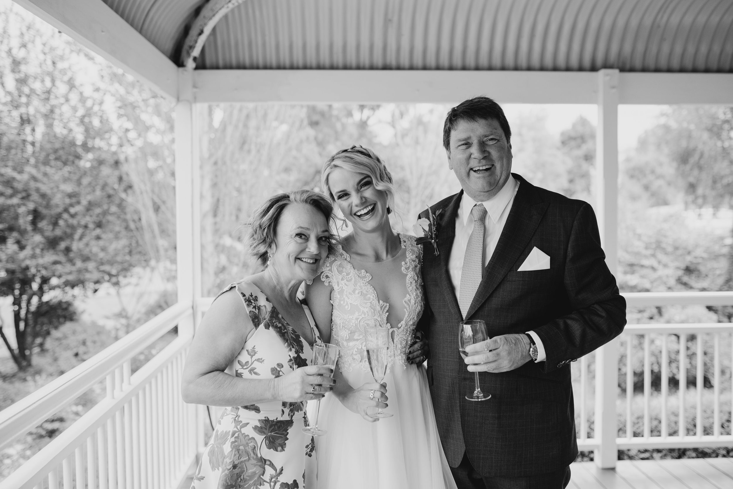 bride with parents - Trent and Jessie photography and videography 