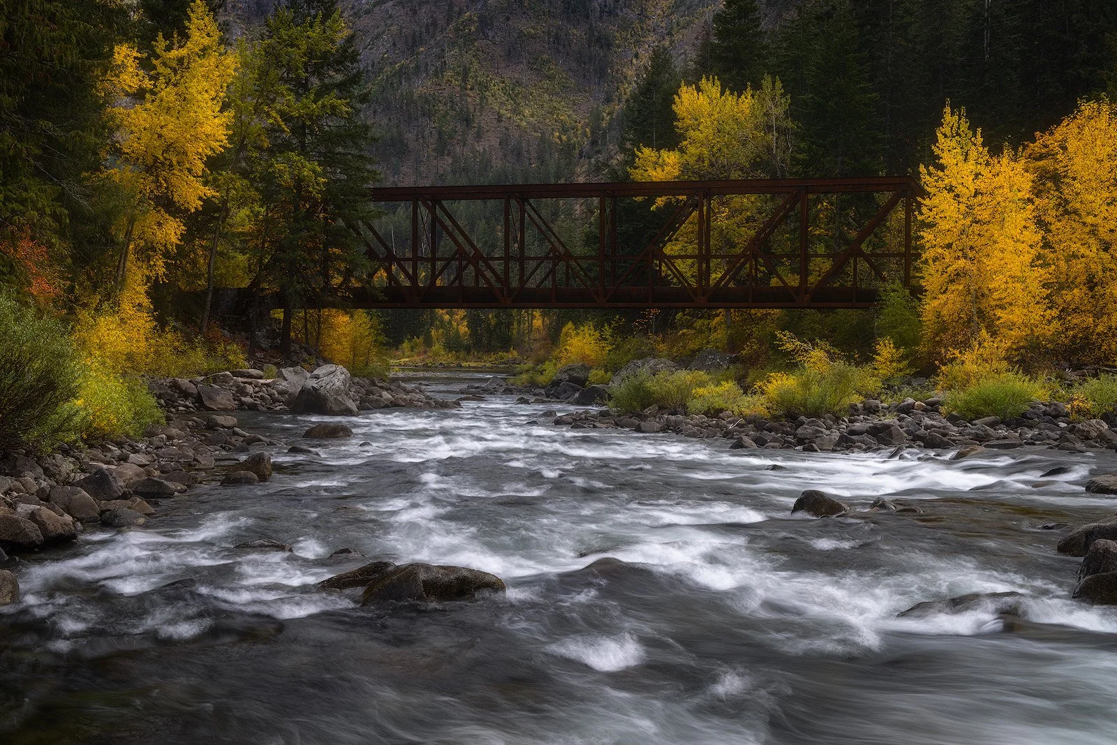 Autumn Colors Along the Wenatchee River Under Historic Iron Bridge – Leavenworth, Washington.jpg