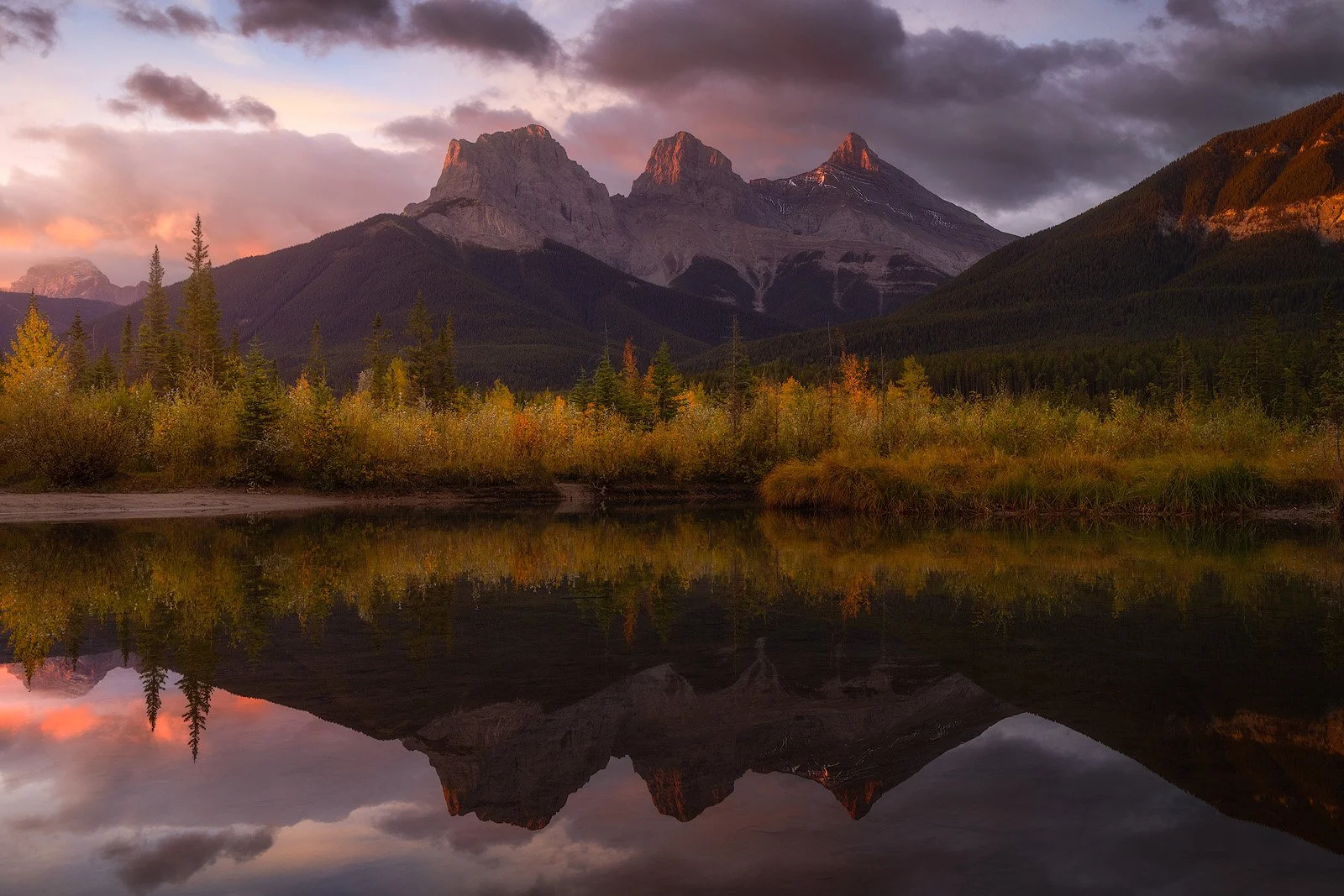 Sunrise Over Three Sisters Mountains Reflected in Autumn Lake.jpg