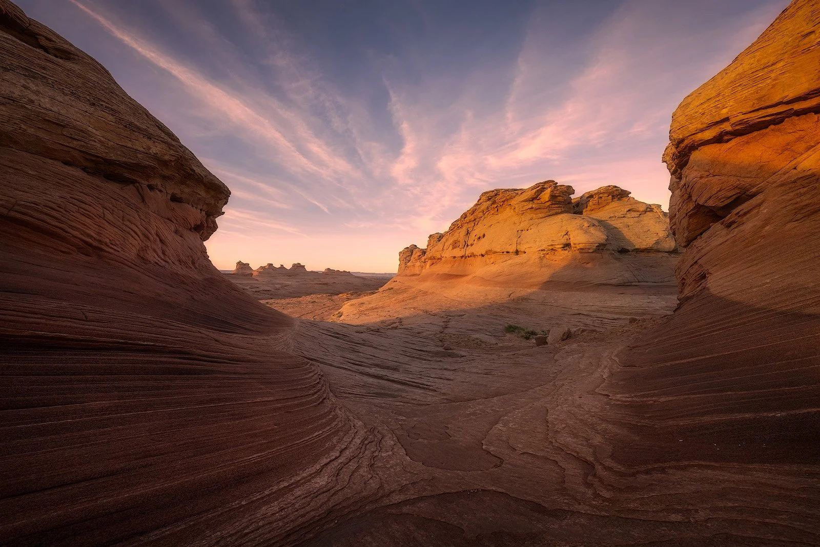 Curving Navajo Sandstone Formations at Sunrise in Utah’s Desert Southwest.jpg