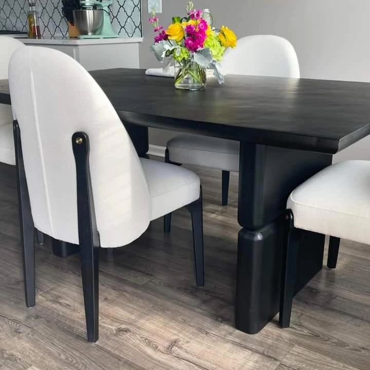 Custom black table with rounded underside and indented legs - looking amazing thanks to our stylish customers!