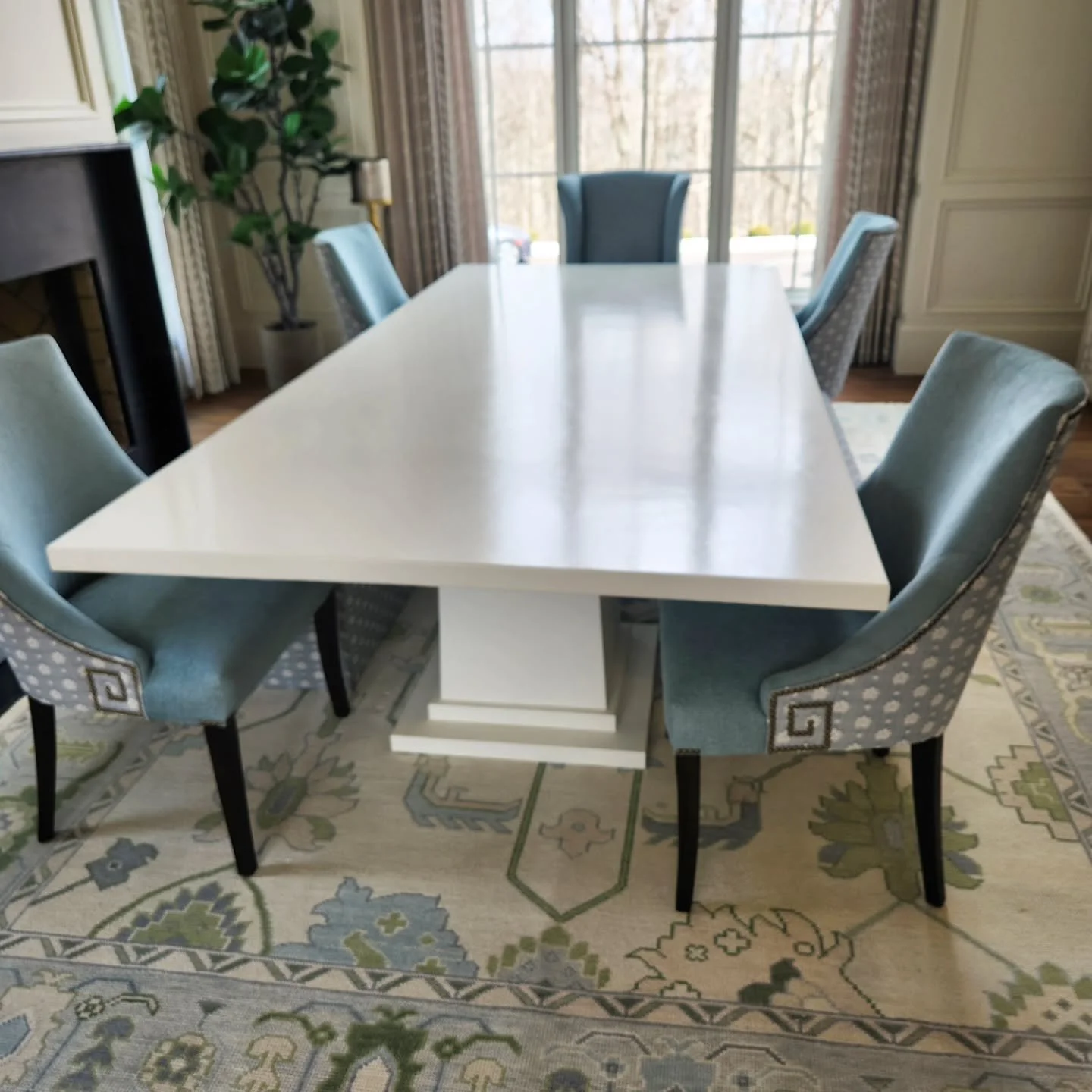 White maple table with gloss finish and classical pillar legs. Loved this house!