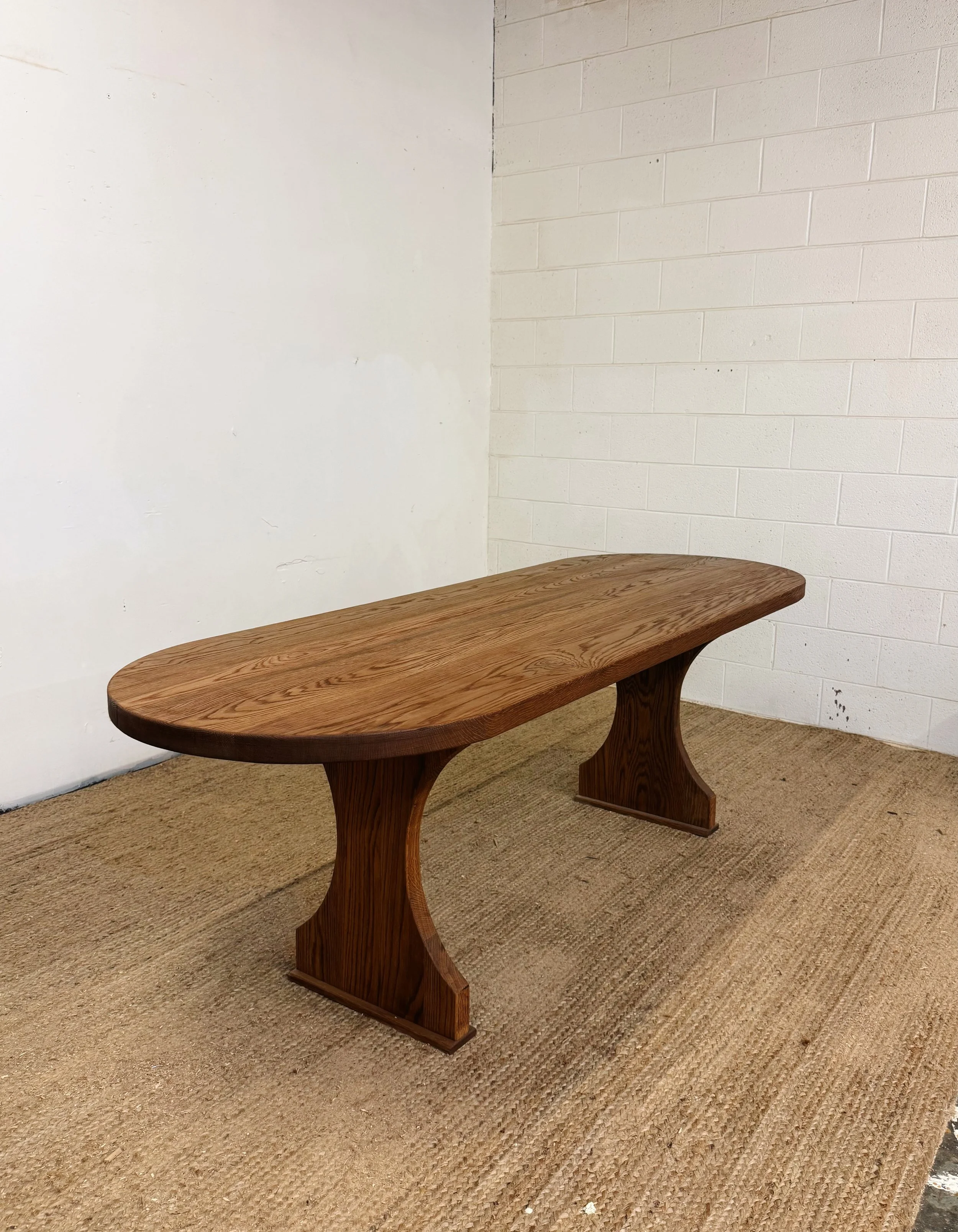 White oak oval w/hour glass legs in special walnut stain