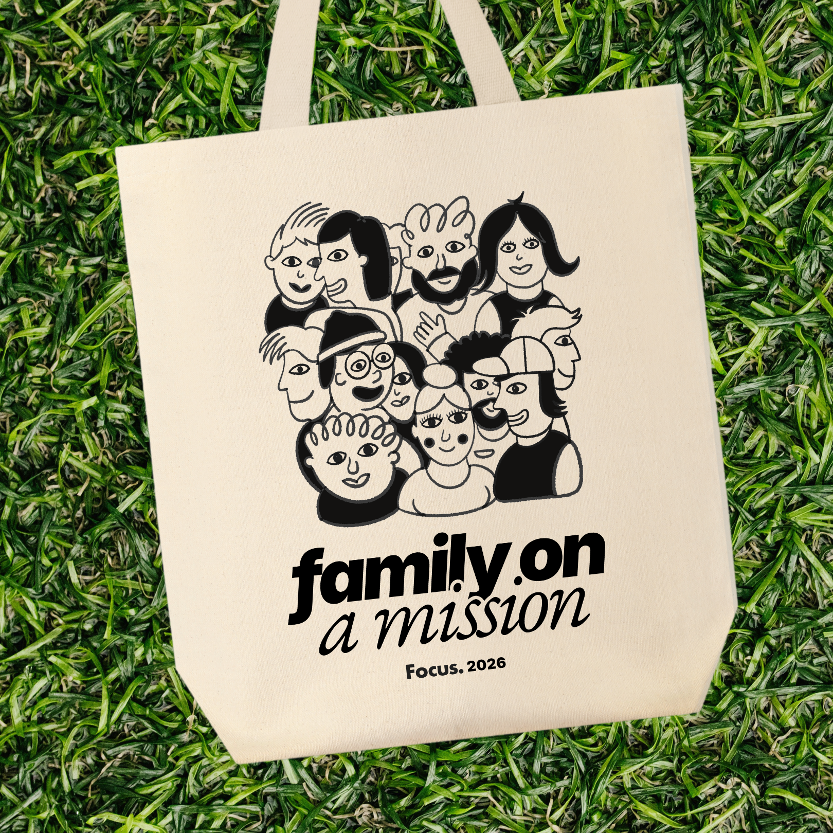 Family on a Mission Natural tote on grass.png