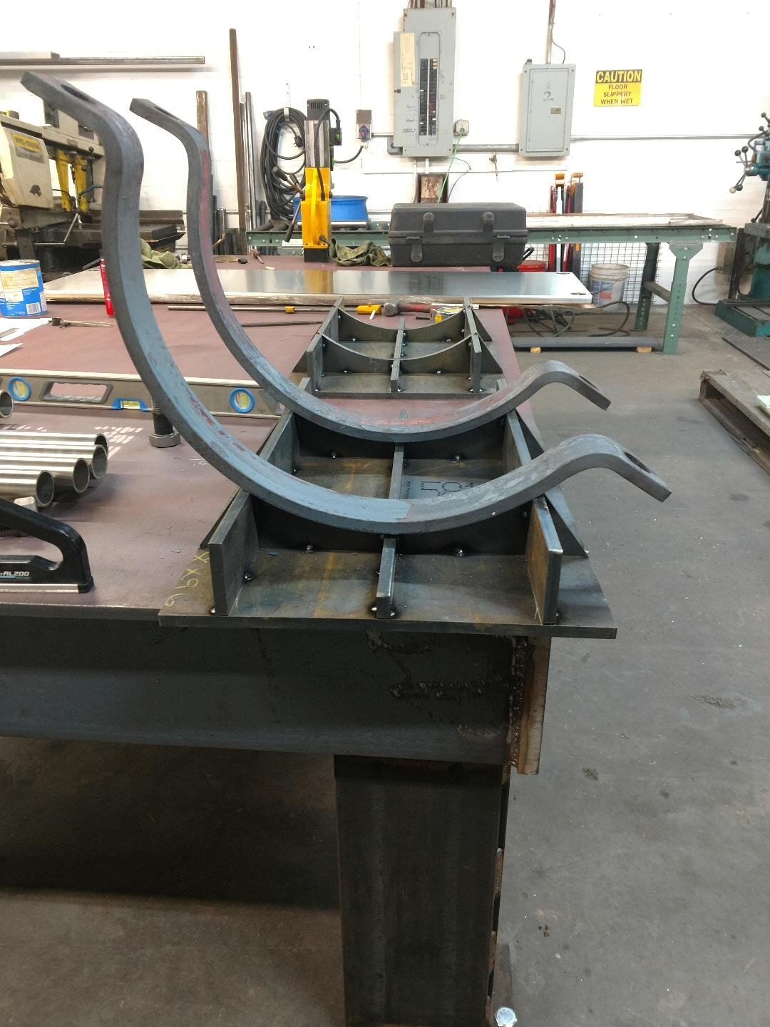 Metal workshop with steel frame on table
