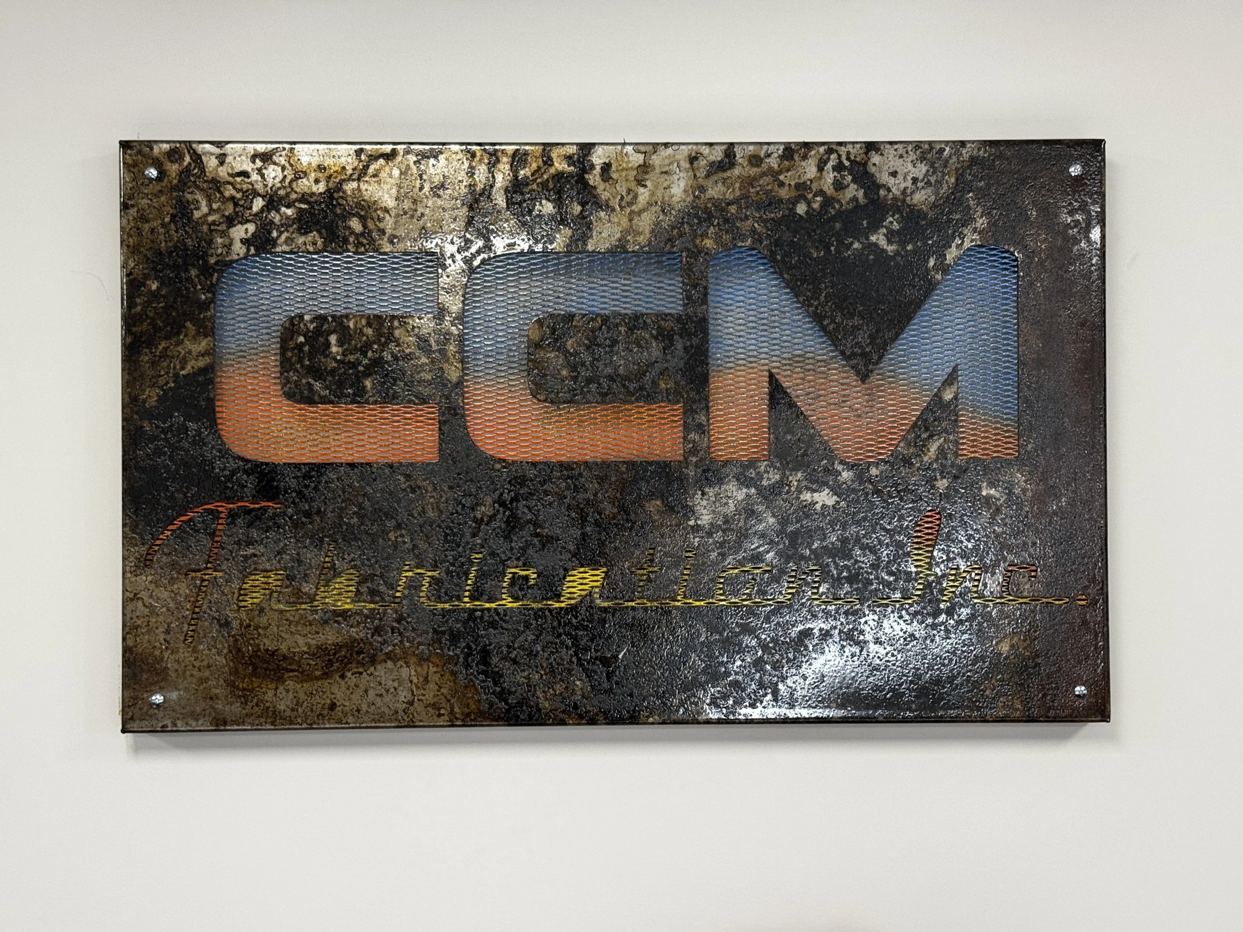 PIC CCM on wall in office 1 .jpeg