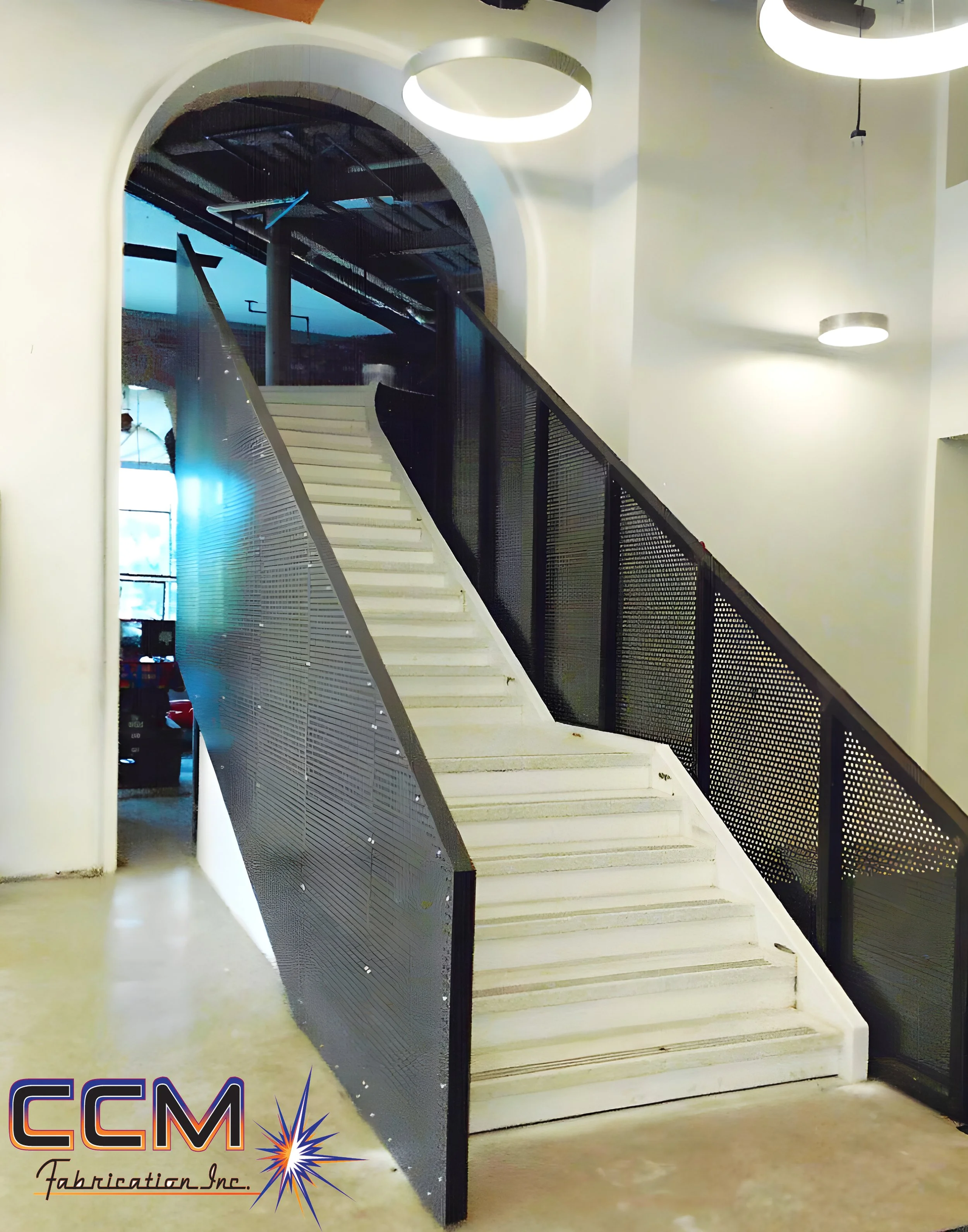 Custom stair railings that are powder coasted and installed by CCM.