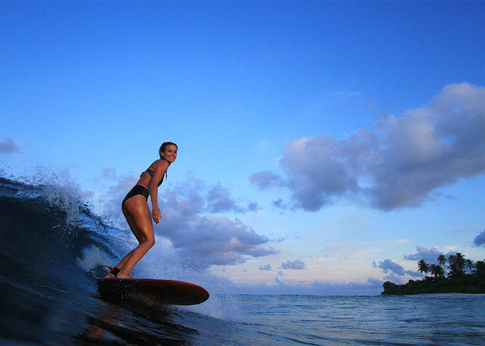 Sophie_Hellyer_Otter_wooden_surfboard_Maldives_Matt_Smith_tight_island_post.jpg