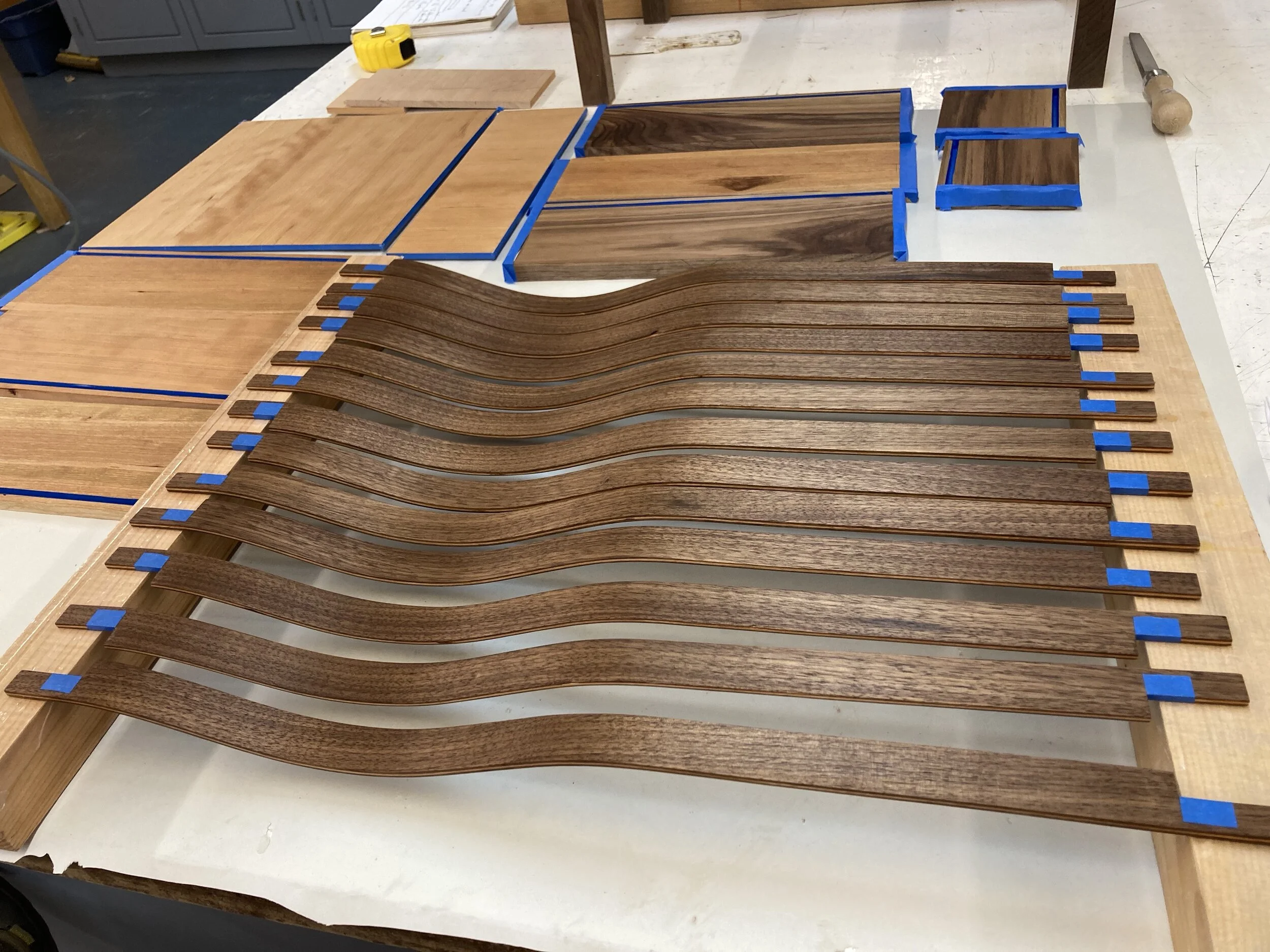 Cold mold laminated elements for bottom shelf