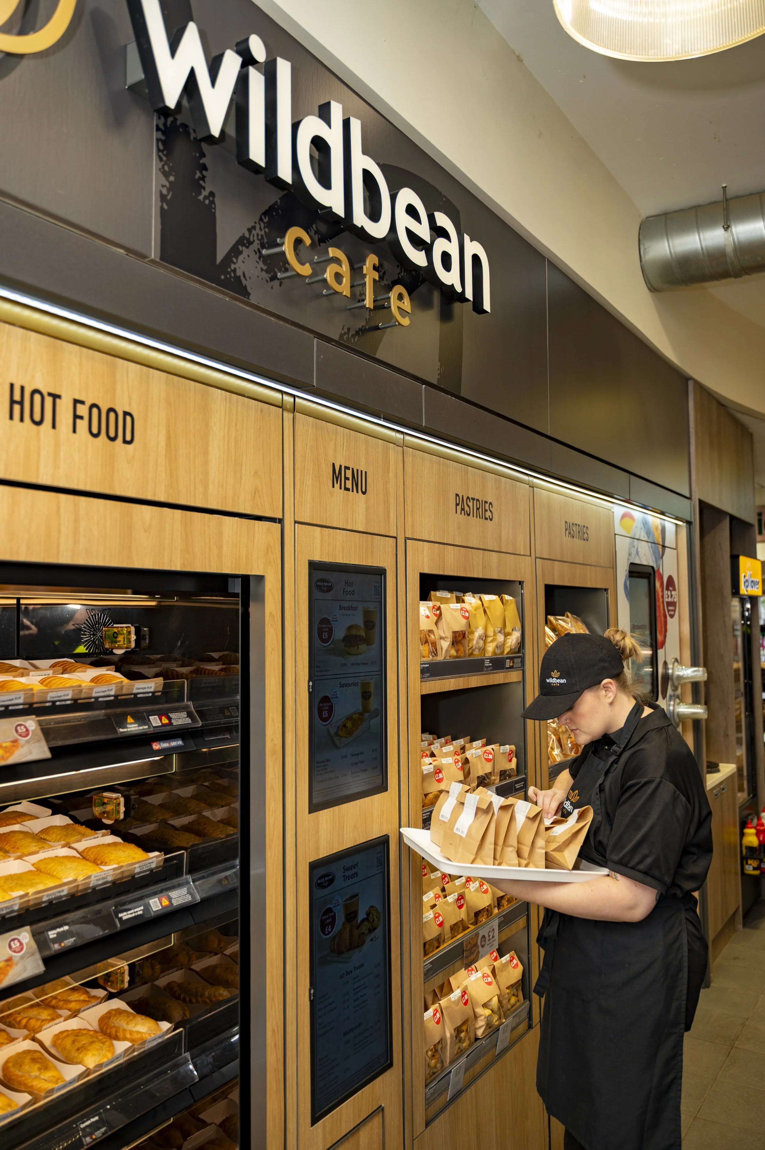 Wildbean cafe staff wearing new branded uniform. 