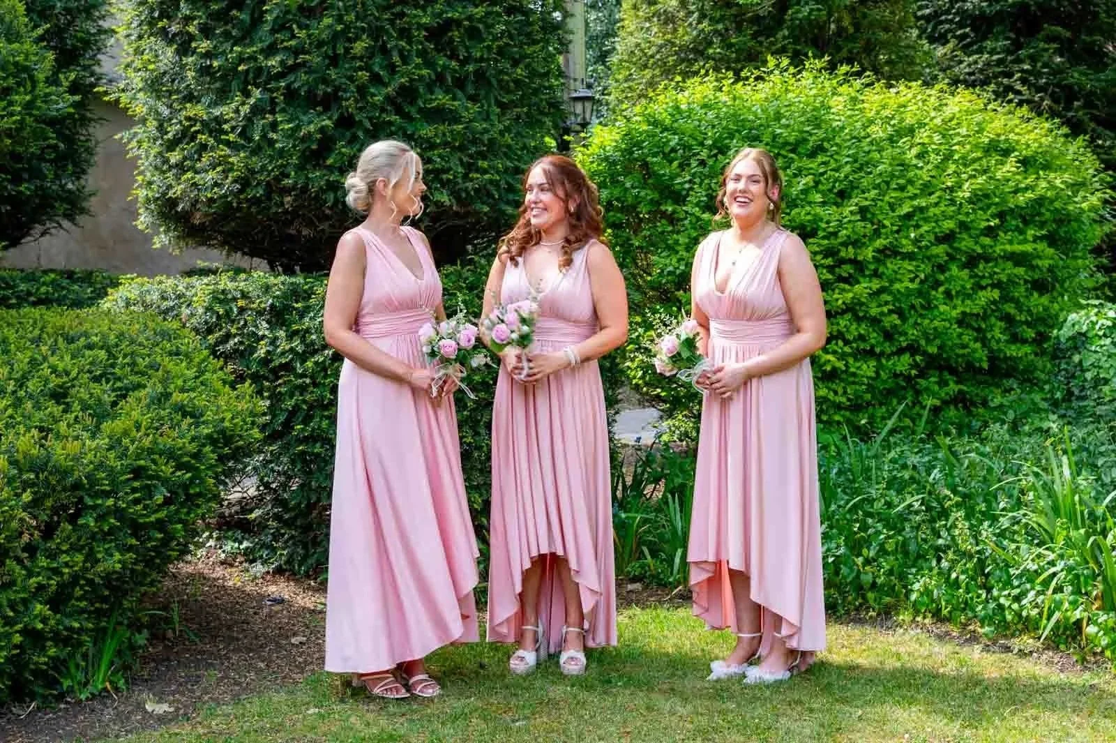 Three bridesmaids at a wedding at The Coseners House Abingdon