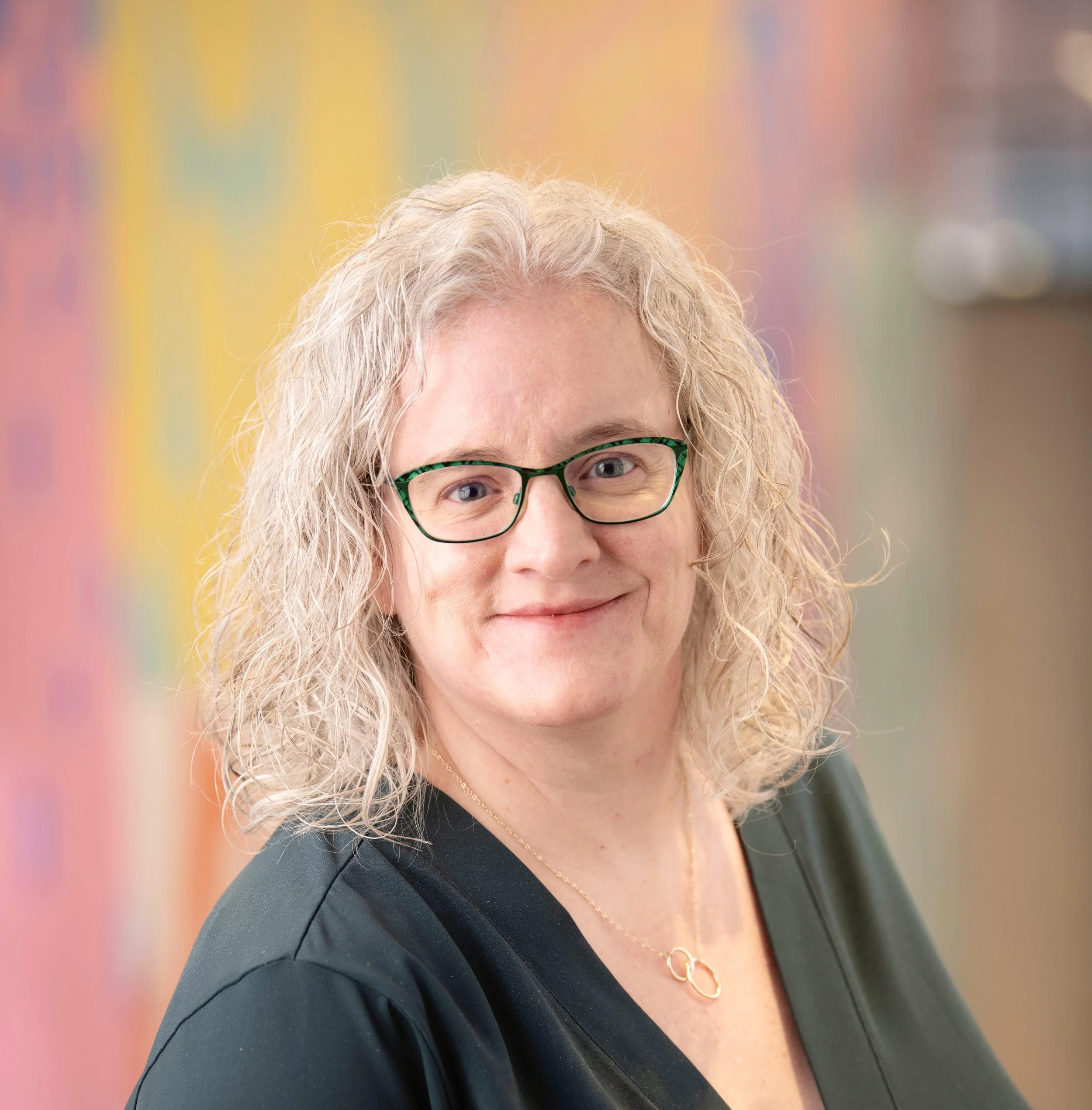 Headshot photo of Maureen