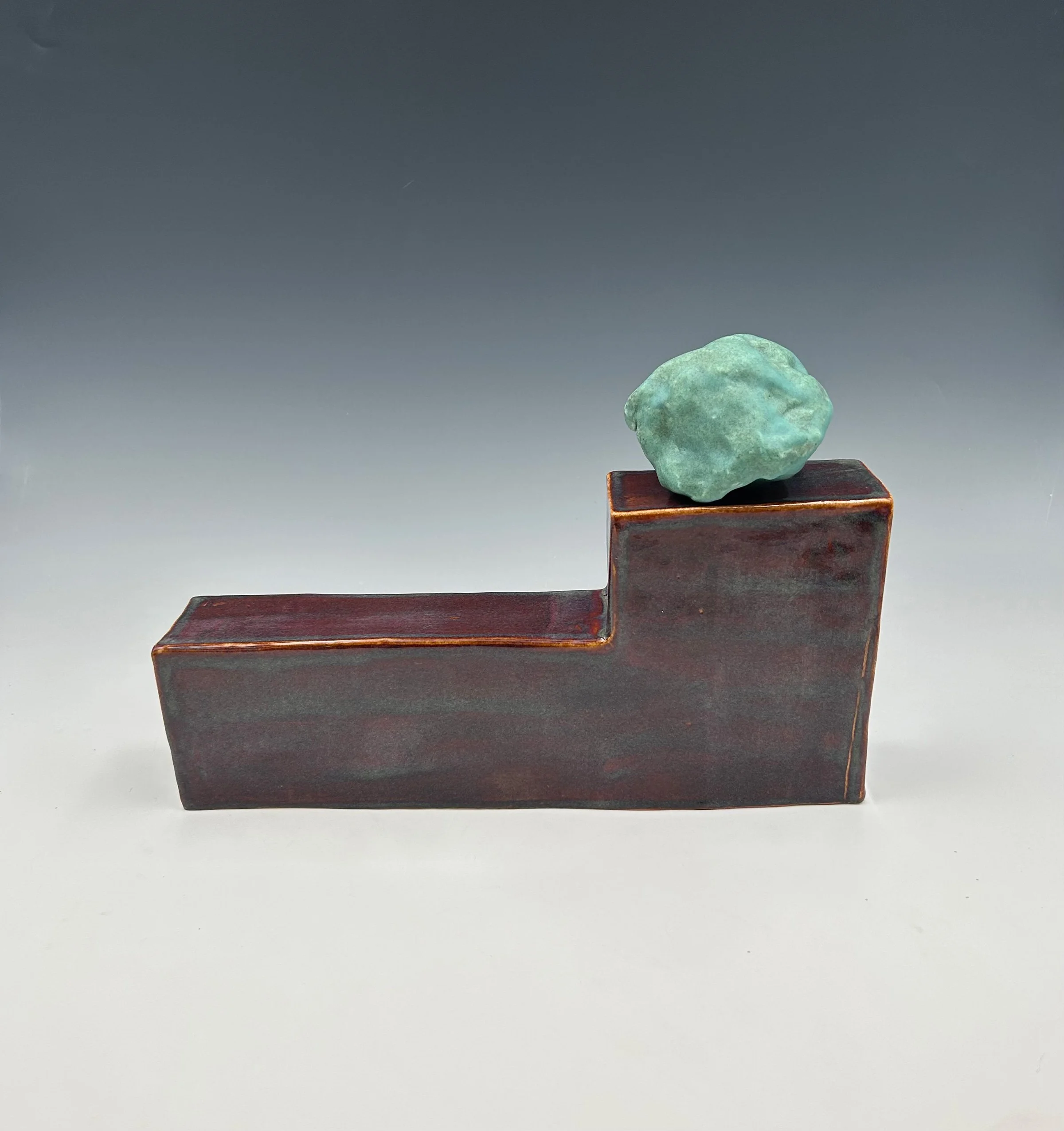 Resting Rock,  Shifting Line, 2024
Stoneware, glaze, engobe
9 x 14 x 4 1/2 inches
