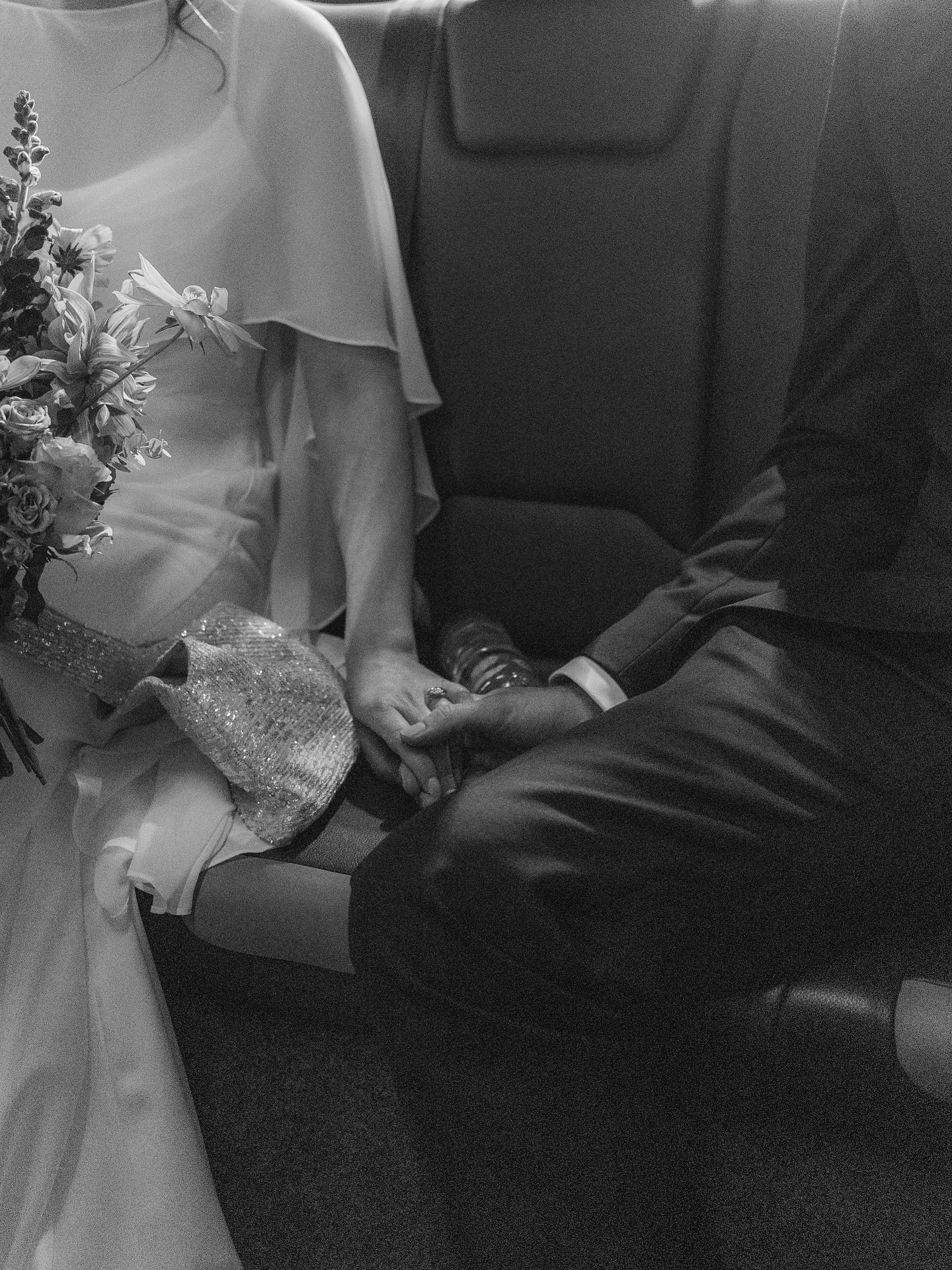 Holding hands on the way to get married ✨

I have the exact same shot without the water bottle but I just love the authenticity of this moment, grain, water bottle and all 🫶🏻