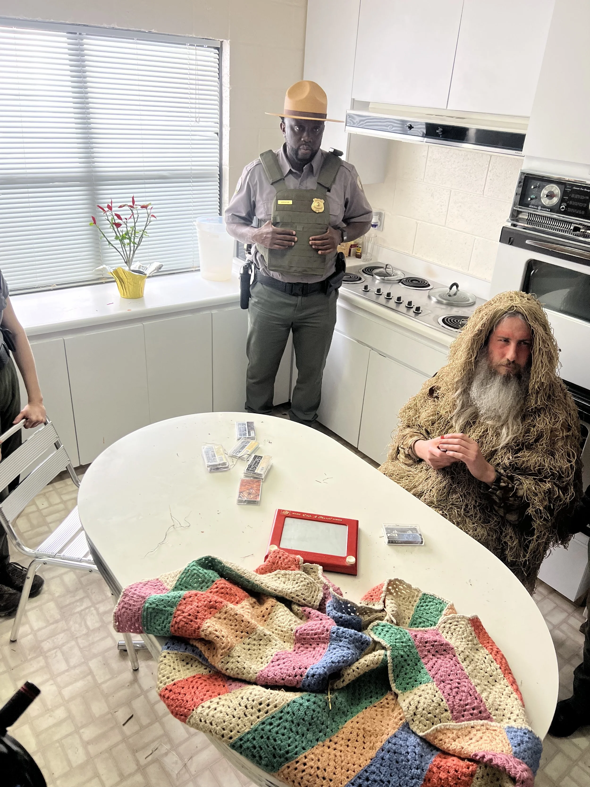 Set Dec for break room interrogation 