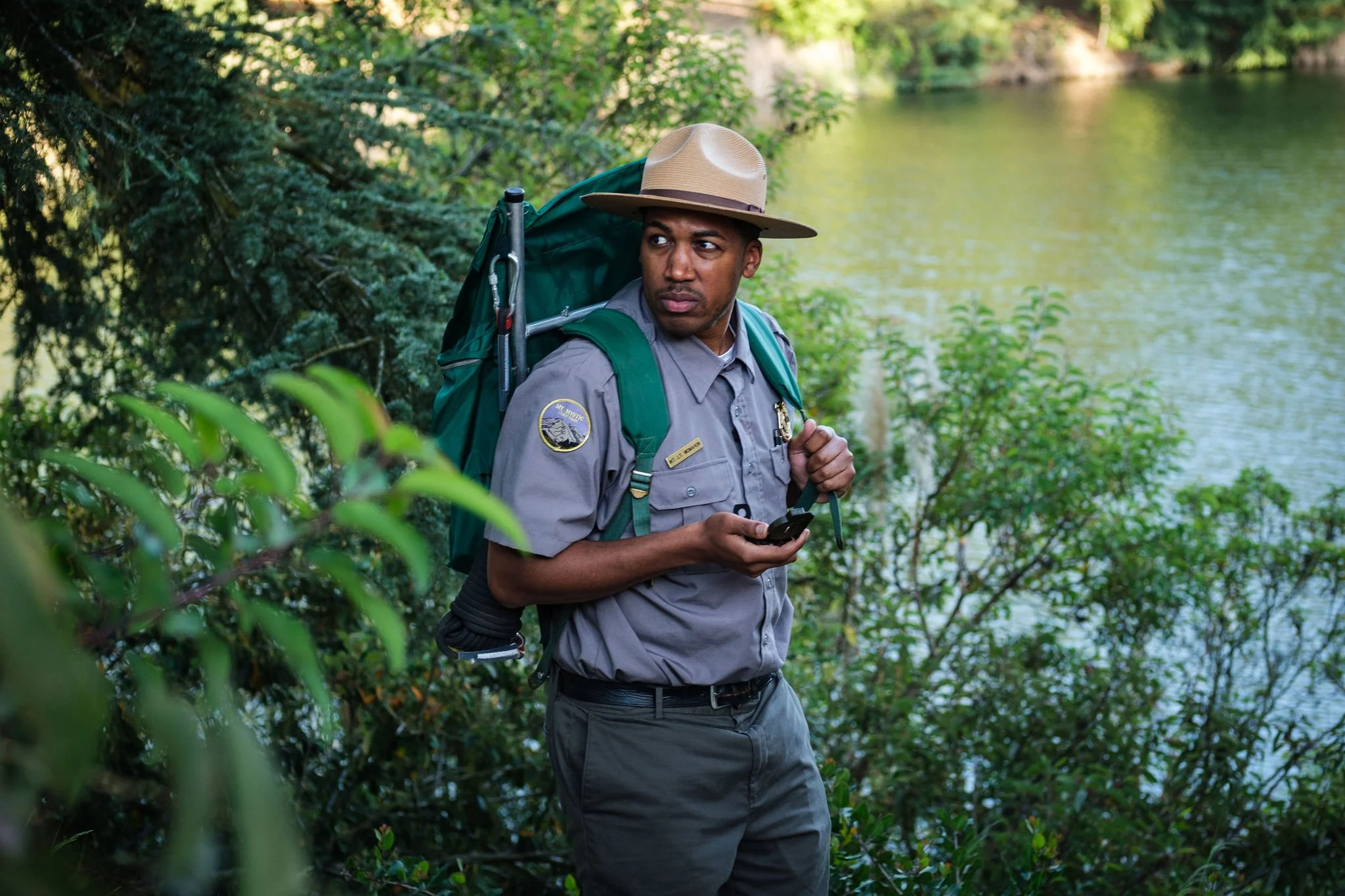 Sourced real vintage camping and ranger gear to fit the agreed aesthetic - seen here is a 1970s camping bag with brace and compass