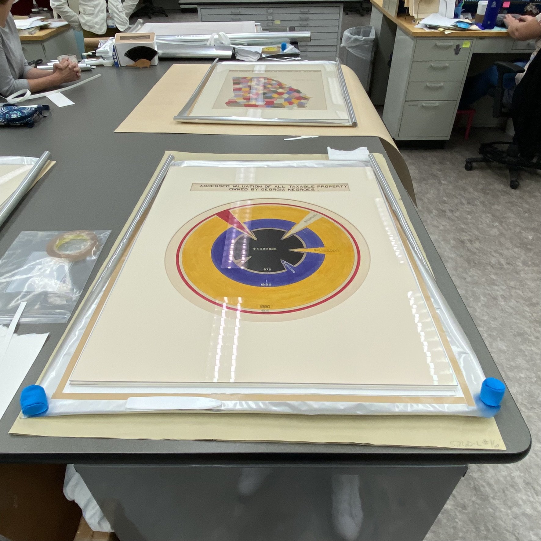 3. Overall view of poster and mat before package sealing