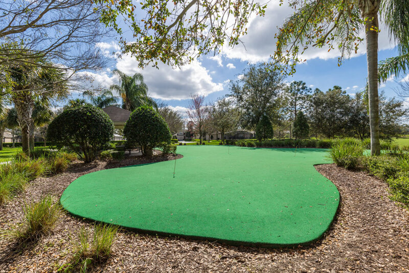  Walk right out the back door to a putting green, sand volleyball, basketball, tennis, grills, and pickle ball courts 