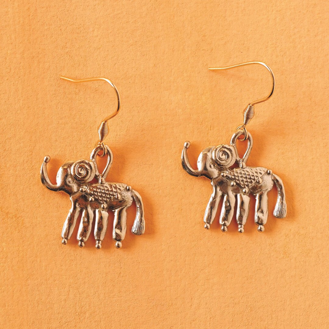 gold circus elephant parade earrings.jpg