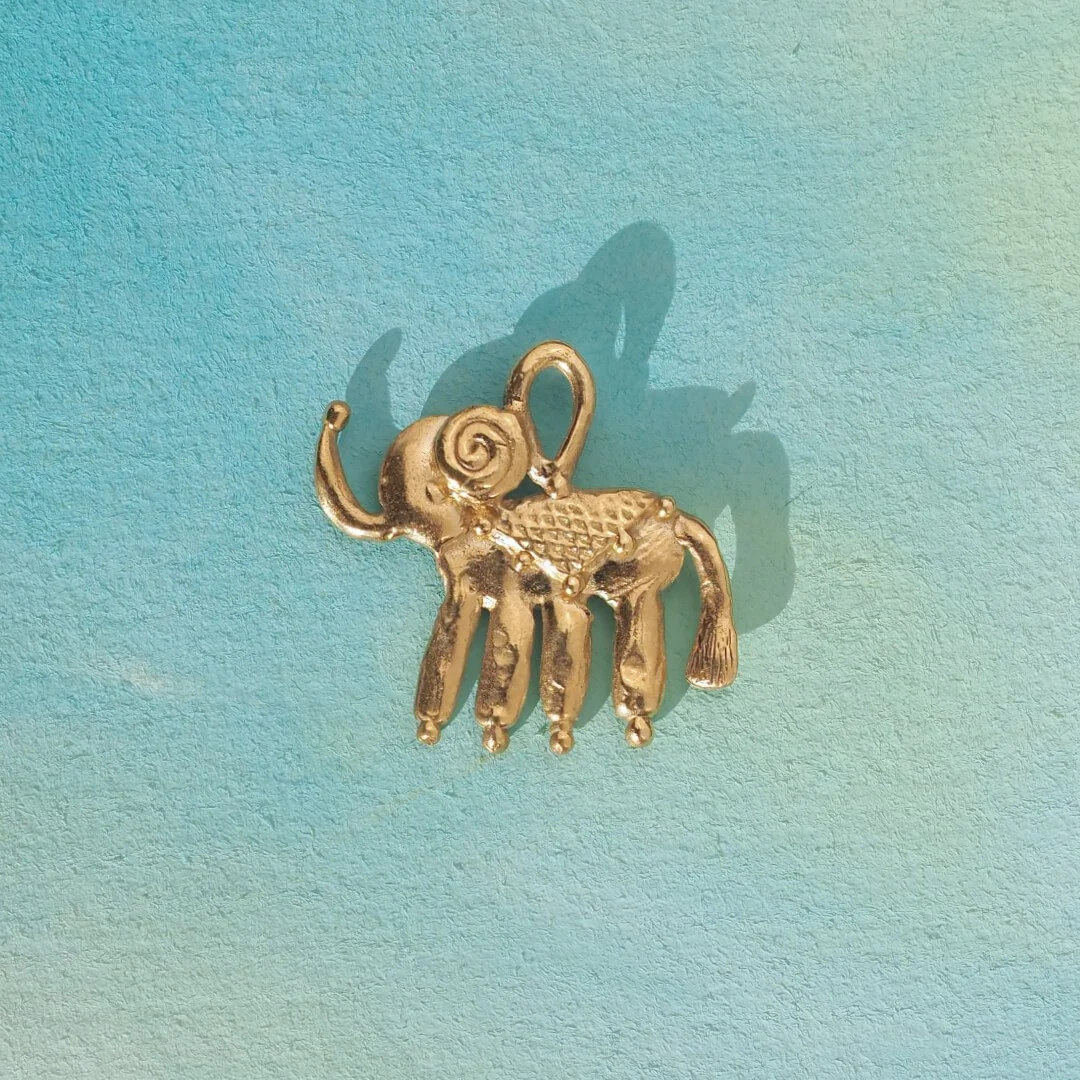 gold elephant pendant.jpg