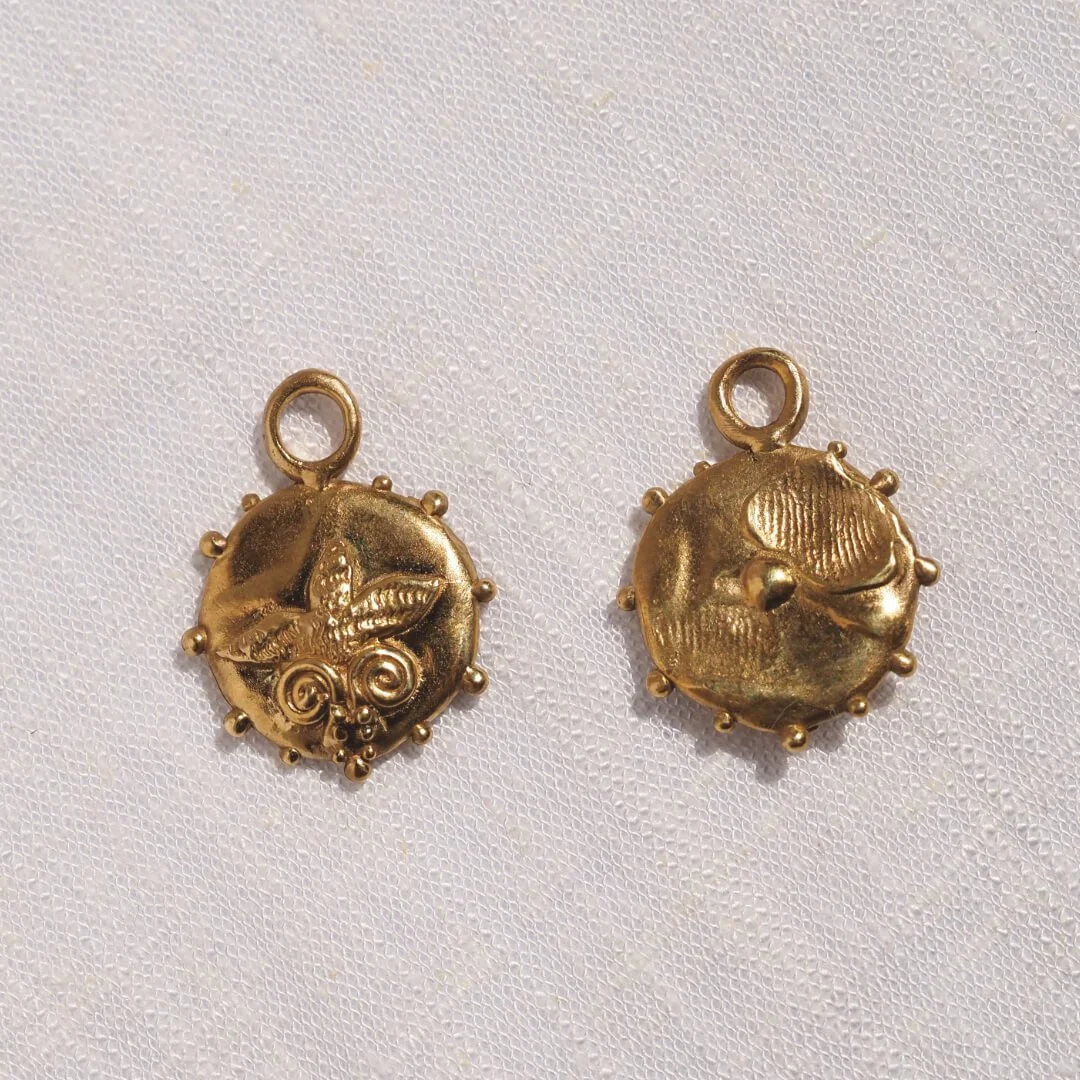 Nikau palm bronze earrings front and back.jpg