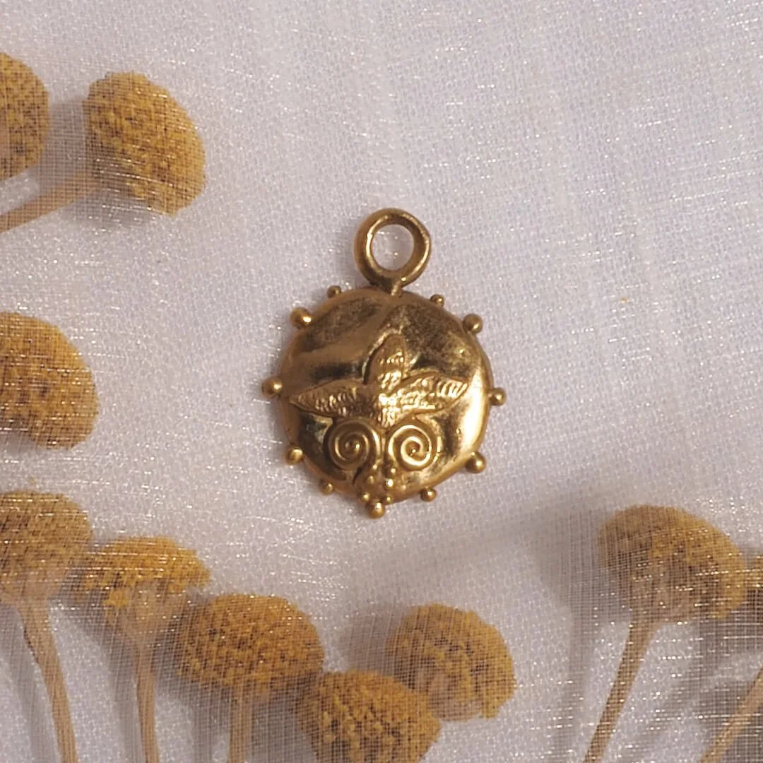 gold bronze palm tree charm.jpg