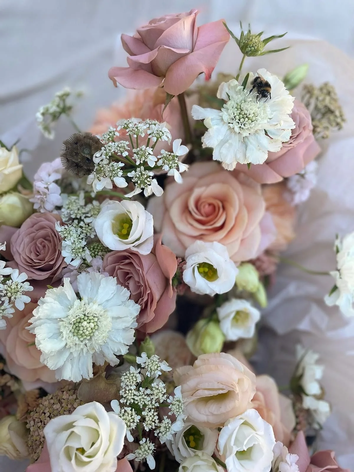 Throwback to H&amp;A's unforgettable wedding day. Creating those gorgeous peach, green, and dusky pink arrangements was pure joy 😍. Next year's diary is filling up fast, especially April to August - but I'm still open for autumn &amp; winter wedding